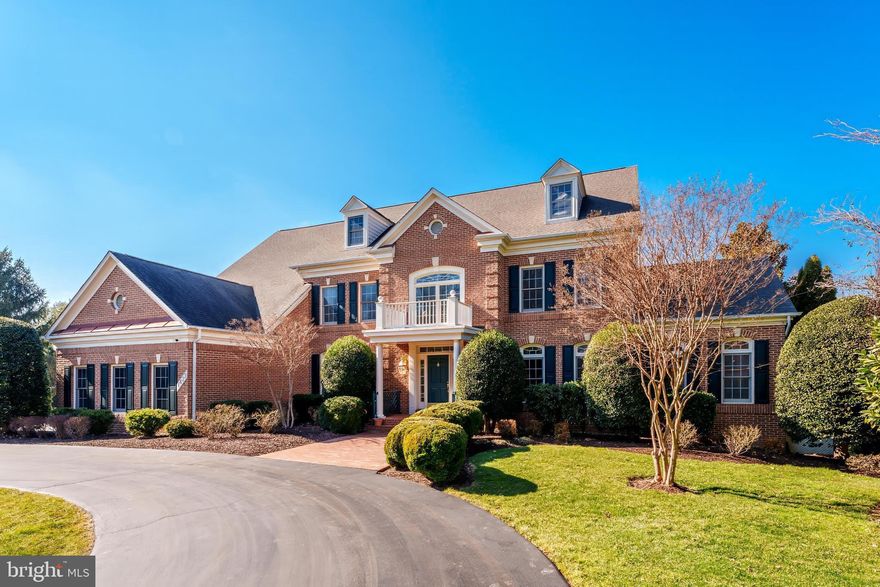 Welcome to 1433 Woodhurst Blvd, a truly exceptional all-brick custom Wyndham model, ideally situated on a rare and expansive 1-acre lot in the prestigious McLean Hundred community. This grand estate offers exquisitely crafted living and entertaining space and enjoys a prime position directly facing the neighborhood park. 
From the moment you enter the soaring two-story foyer featuring diagonal grid marble floors, you’re greeted by a home designed to impress. The main level showcases timeless luxury, featuring oak hardwood floors, intricate tray ceilings, and crown molding throughout. The spacious formal living and dining rooms set the stage for elegant entertaining, while the light-filled sunroom and private office with a custom oak bookcase provide space for relaxation and productivity. The expansive family room, with its dramatic masonry fireplace, skylights, and wet bar, is the perfect centerpiece for gatherings. The chef’s kitchen, entirely with upgraded stainless steel appliances, abundant cabinetry and countertop space, and a sunlit breakfast area, opens to a deck that overlooks the sprawling backyard. A convenient three-car side-load garage, designed for easy access and added curb appeal, completes the main level. 
Upstairs, the lavish primary suite offers a private retreat with a cozy sitting area, a dual-sided fireplace, a walk-in closet, and a spa-like ensuite featuring a jacuzzi jetted tub, dual vanities, and an oversized shower. Three additional oversized bedrooms, each with hardwood floors and access to spacious bathrooms, provide comfort and privacy.
The walkout lower level is equally impressive, offering a massive recreation area bathed in natural light, two large bedrooms, two full bathrooms, and versatile spaces for fitness, storage, or hobbies. Outside, the 1-acre lot provides a tranquil and private setting with endless possibilities, from entertaining on the deck to creating your dream outdoor oasis.
Situated just minutes from Tysons Corner, the Silver Line Metro, Dulles Toll Road, and major commuter routes, this home offers a serene, luxurious lifestyle with unparalleled convenience. 1433 Woodhurst Blvd isn’t just a home—it’s a destination for living, entertaining, and creating lasting memories.