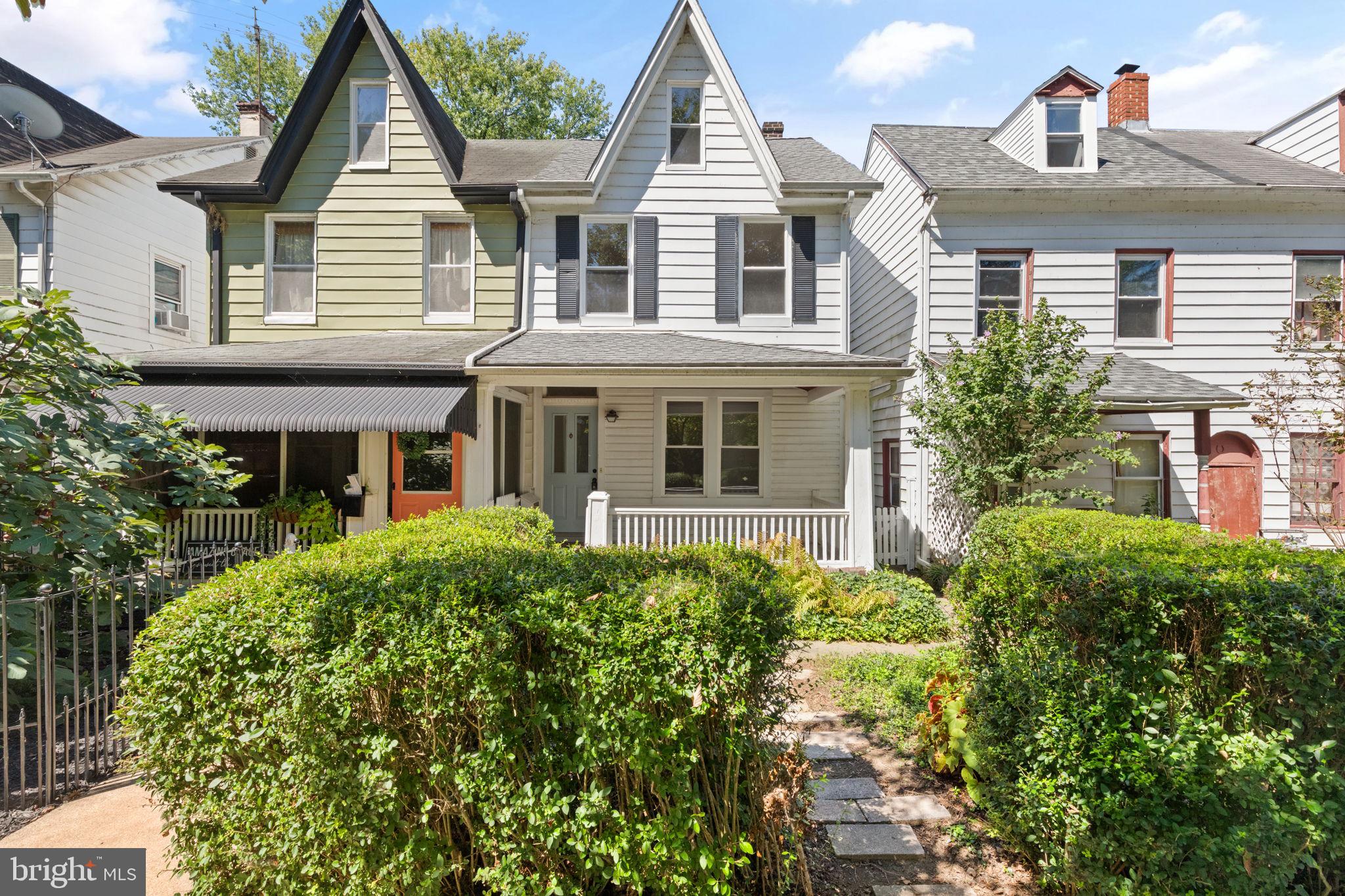 Vintage meets modern living! This beautifully updated semi-detached Victorian in the desirable south end of town combines classic character with modern convenience. Recent upgrades include top-of-the-line smart appliances, all-new windows, fresh paint, updated lighting, and nice finishes throughout. Enjoy relaxing on the spacious front porch while taking in the views of the beautifully manicured Vandiver Inn properties. The front and rear yards offer garden-like landscaping, with the fenced backyard featuring a storage shed for added convenience. Inside, you'll find hardwood floors, a bright and spacious living room, and a formal dining room. The updated kitchen boasts new luxury vinyl plank flooring, quartz countertops, and brand-new Samsung finger print resistant appliances including: *Smart stove with SmartThings connectivity, *WiFi-enabled Family Hub refrigerator with Alexa, *All-in-one ultra quiet washer/dryer combo with AI Home LCD touch display (completes full cycle in just 68 minutes!), and new dishwasher. Upstairs offers three bedrooms and full bath, with a fourth bedroom on the third floor. Additional highlights: Resident-only street parking, adjacent lot on Freedom Lane available for purchase (perfect for the off-street parking possibility), prime location for the annual 4th of July parade, stroll along tree-lined Union Avenue, catch a show at the STAR Theater, and explore local shops and dining nearby. This home blends historic charm with modern technology. Schedule your showing today!