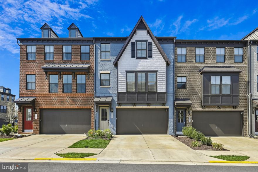 Welcome home to this beautiful slice of heaven.  In a prime location near shopping, dining, recreation and  entertainment, this gorgeous townhome is only three years young and  in pristine condition.  Three levels with bump outs and balconies are all  washed in delightful natural light.  The open floor plan on the main level includes a lovely dining area, living room with gas fireplace, a cozy extra seating area and a  gorgeous kitchen with quartz countertops, an oversized island - large enough for five comfy bar chairs - abundant cabinetry, two pantry closets and a handy half bath.  Upstairs there are three bedrooms including the expanded  primary suite that spans the rear of this level with its own private balcony, two large walk-in closets and primary bath with a spa shower,  double  vanity and private loo. The laundry room and a second full bath are on this level as well. On the lower level, there is  a recreation room, currently being used as an in-law/au pair or guest suite, with another large walk-in closet, full bath and sliding glass door to its own private patio.  There is also access to the garage here, with a well appointed mud room area  complete with shelving,  cubbies and coat closet. This special property backs to a  permanently protected wooded pocket garden  and the community park where you will find a handsome gazebo, stone seating walls,  benches,  picnic tables and paths. Located in the vibrant community of Potomac Trace in Alexandria, it is easy walking distance to the Sherwood Hall Library, where the McCutcheon Farmers market runs weekly from May through November, INOVA Mount Vernon hospital and many shopping/dining options at the Mount Vernon Plaza Shopping Center and surrounding area. It  is a short drive to the Potomac River, Reagan National Airport, historic Old Town Alexandria and all of the amenities that the greater Metro area has to offer!