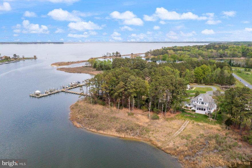 Beautiful Waterfront Retreat in Homeport Community
Welcome to your dream waterfront home, nestled in the highly sought-after community of Homeport. Perfectly situated as a gateway form Winchester Creek to the Chester River, the Narrows, and all the beauty and recreation the Shore has to offer, this stunning brick-front home combines spacious living with breathtaking views of natural wetlands and wildlife.
Boasting over 4,400 sq. ft. of thoughtfully designed living space, this home features 5 bedrooms and 4.5 bathrooms, with a main-level Primary suite with fully renovated primary bath that is exquisite. There is an additional guest bedroom and full bath — perfect for visiting family and friends. Enjoy spectacular water views from all three levels, each offering ideal spaces for relaxation and entertainment.
The first-floor family room showcases a striking stone fireplace and expansive windows that frame serene views of blue herons, ospreys, ducks, geese, and even the occasional eagle. The adjacent water-view kitchen and dining area invite lively gatherings and memorable meals. Hardwood floors grace the lower level, which also features a second fireplace and additional dining space.
The second floor is dedicated to three bedrooms one full bath and a very large bonus space for the buyer needs, such as a 6th bedroom and bath, office, family room, exercise space and much more.
Head to the third floor to discover a large entertaining area complete with a full bar, sink, beverage cooler, and full bath — the perfect setting for game nights or casual get-togethers.
Outdoor living is just as spectacular, with a large covered deck, a second deck featuring a hot tub, and a patio area for soaking in the natural beauty. A spacious two-car garage adds convenience. Comfort is ensured year-round with three independent HVAC with back up propane system for energy efficiency, one for each floor.
Homeport offers a community pier and dock, maintained through low HOA fees. This home includes a deeded 40 ft. boat slip with 4+ MLW, a dedicated 12,500-pound boat lift, and a separate 2,500-pound lift for jet skis or a small boat. Just steps away from your back door, it’s effortless to load up and head out for a day of fishing or boating adventures.
The current Buffer Management Plan (BMP) allows a path to the water's edge for kayaking, fishing, and relaxing evenings by the shore. The current seller has added a landscape plan that raising the grade of the property, adding a French drain and landscape.
Conveniently located with easy access to Route 50 and just a 10-minute drive to the Bay Bridge, this is waterfront living without the long commute. Don’t miss the opportunity to make this exceptional property your new home. Schedule your tour today and start living the waterfront lifestyle you deserve!