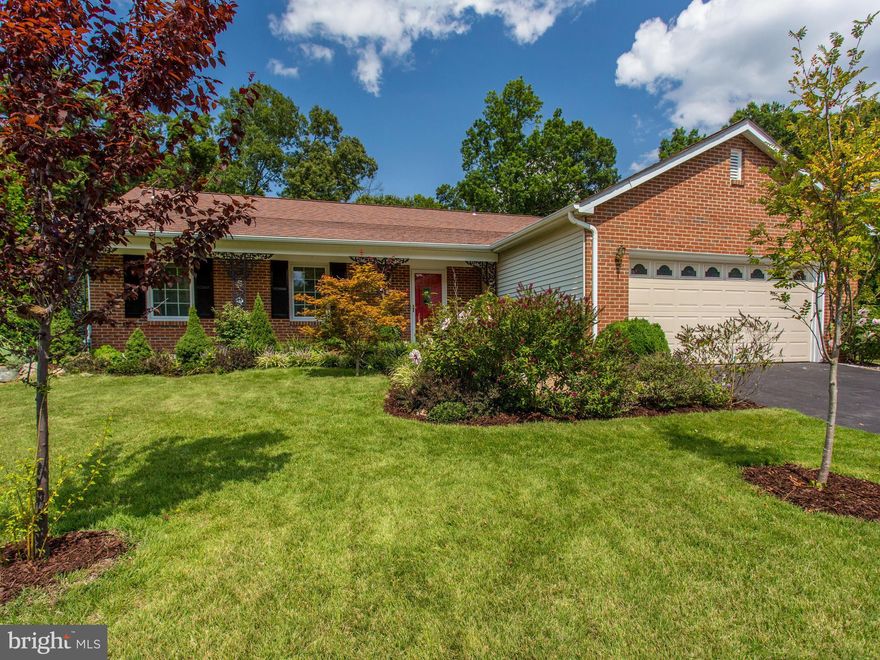 Just move in!! This house has been updated throughout & meticulously maintained. Open concept with gourmet kitchen & vaulted ceiling.  Lovely wide street with sidewalks & newer homes. Private yard backing to Fairfax County greenspace with custom patio & Azek Deck. Shed has lighting & electricity. Open basement with built in bar & large workroom. Close to Ft Belvoir, Old Town & GW Parkway Path