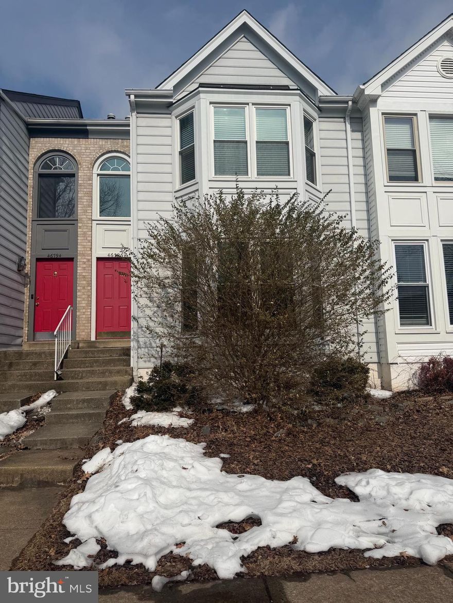 Welcome to this beautifully updated 3-bedroom, 4-bath townhome offering refined living across three finished levels in a highly desirable Sterling location.

The main level is anchored by updated hardwood flooring and freshly painted living spaces, creating a sophisticated yet welcoming atmosphere. The renovated kitchen blends style and function with soft-close cabinetry, LifeProof vinyl plank flooring, subway tile backsplash, updated hardware, and LG appliances. Marble tile accents at the fireplace and kitchen bump-out window introduce architectural interest and a layer of timeless elegance.

Upstairs, the primary suite offers a spacious and serene retreat, complemented by a remodeled bath with quality finishes. Two additional well-proportioned bedrooms and an updated hall bath provide comfort and flexibility for family, guests, or workspace needs. Triple-pane windows on the main and upper levels enhance both comfort and efficiency.

The finished lower level adds valuable living space with brand-new carpet and a freshly painted room, ideal for a recreation lounge, private office, fitness area, or media space. A full bath on this level increases functionality and convenience.

Outdoor living is elevated by a custom paver patio with a built-in Trex bench, creating a private setting designed for both entertaining and quiet evenings. Additional improvements include updated front and rear doors, aluminum capping, and a replaced AC system.

Ideally situated near major commuter routes including Route 7 and Route 28, as well as shopping, dining, parks, and everyday conveniences, this home offers both accessibility and comfort in one of Sterling’s most convenient settings.