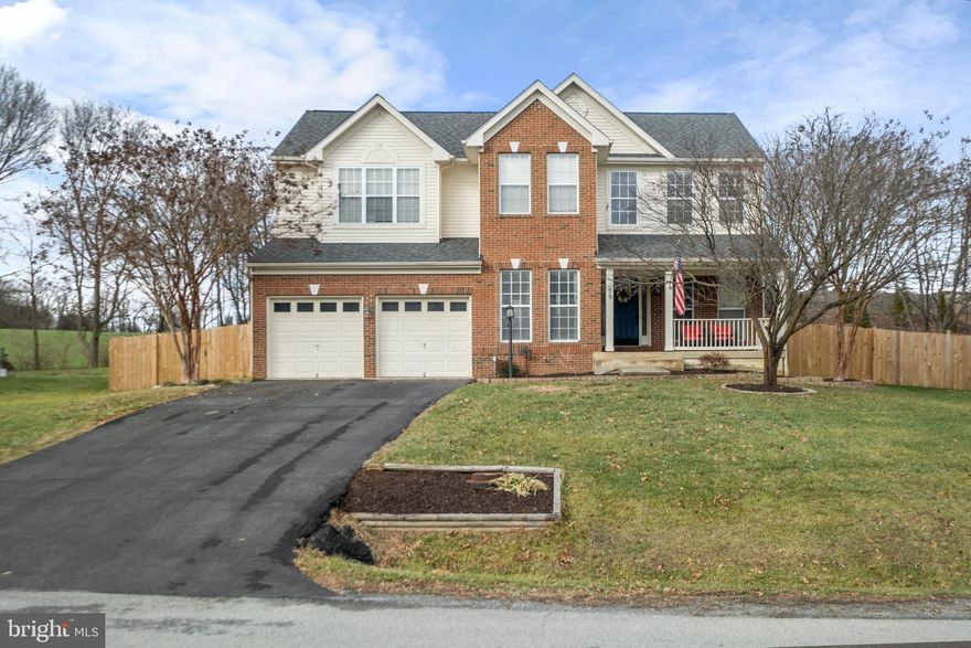 Beautifully maintained 5BR/3BA home in a fantastic commuter-friendly location—just minutes from downtown Charles Town, Route 340, and Route 9. This home offers upgraded flooring, granite countertops, a striking stone fireplace, and spacious rooms. Enjoy the convenience of a private office, an expansive private primary suite with its own entertainment area, and an upstairs laundry room. The finished basement includes a private bedroom, bathroom, workout area, and ample storage. Outside patio is perfect for entertaining—or relax on the inviting front porch. 
The large fenced backyard backs to open farmland, offering a peaceful setting. The pool and shed convey, while the jacuzzi will be removed. Dual-zone HVAC (propane & electric) ensures year-round comfort. Generator hookup! Owner Occupied. Please remove shoes upon entry, or use shoe covers.