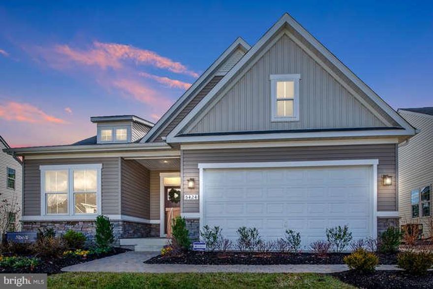 Stunning model home now available! These do not come around too often. Elegant main level living home with MANY upgrades all at a GREAT price! This is a must see.  Open Floor plan with beautiful lighting, large kitchen w/ SS appliances, granite counters, and upgraded cabinets.  Main level bedrooms with a walkout covered deck. Finished basement boasts large living space, rec room area w/ full bathroom, all while leaving a substantial storage room. Fully conditioned garage and Professionally landscaped with in-ground sprinkler system.  This is a MUST see!