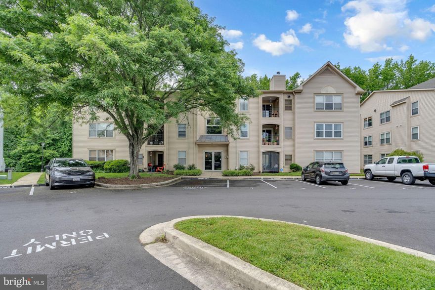 Experience the best of both nature and city living in this spacious top-floor unit at Annapolis Overlook. With nearly 1,400 sq ft, this 2-bedroom, 2-bathroom home offers high ceilings, generous living space, a cozy fireplace, and a balcony overlooking a wooded setting—yet it's just minutes from Downtown Annapolis! You'll enjoy easy access to restaurants, shopping, and entertainment, as well as close proximity to the U.S. Naval Academy and local schools. Quick access to Route 50 and the Bay Bridge makes commuting a breeze.

Recent upgrades include a new HVAC unit installed in Fall 2023 and new energy-efficient patio doors, installed in 2023 and new toilets. The home also features updated vanities, mirrors, and fresh paint throughout. Don’t miss this opportunity for a top-floor unit in an incredibly convenient location! Secured front door access and assigned parking spaces complete the package.