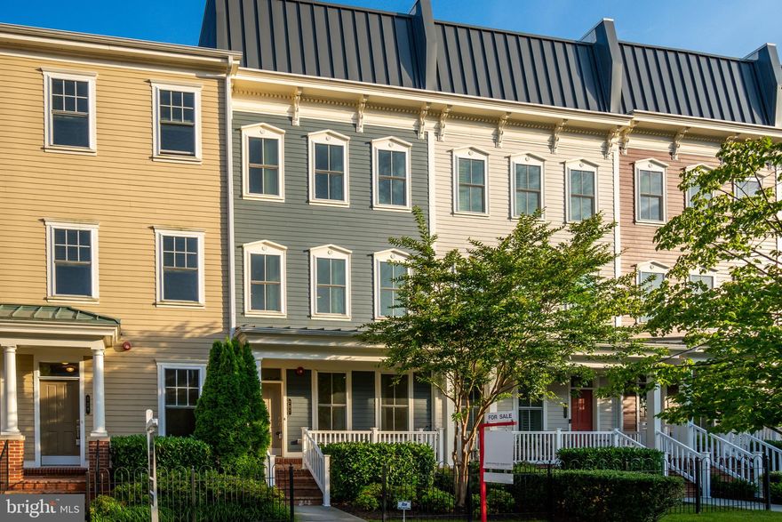 Welcome to 727 Annie Rose Avenue, a sophisticated Alexandria townhome in the convenient Potomac Yard neighborhood. Walk past the inviting front porch and step inside and find yourself enchanted by 2,464 square feet of pure elegance, featuring 3 delightful bedrooms, 3.5 bathrooms plus an 4th level versatile space that can be used as a  4th bedroom! 
Whip up culinary masterpieces in a kitchen that would make even top chefs swoon, complete with a sleek cooktop, wall oven, ample cabinet space, and  granite countertops. . And for those who appreciate the finer things in life, a wine cooler awaits your most cherished vintages.
The spacious main level features 10ft ceilings, an open dining and living room, and great natural light. Cozy up by the fireplace with a good book or enjoy a glass of wine on your private balcony—your options for relaxation are endless.
The primary suite is a dream come true, boasting dual closets,  a spacious primary bathroom with dual vanities and an oversized shower.  Across the hall is a 2nd bedroom with an ensuite bathroom. Walk up to the 4th level that features and very versatile room which can be used as a 4th bedroom! And when you're in need of some fresh air, your rooftop deck is the perfect escape, offering views as expansive as your imagination. The townhome comes equipped with a 2 car garage, additional two parking spaces in the driveway, and a friendly front porch! 
 Close to Reagan National Airport, GW Parkway, DC, Del Ray, and much more. Park your car in the 2 car garage and walk to Potomac Yard metro, dining and shopping, and more! Welcome Home!