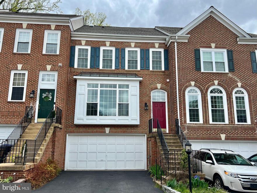 Beautifully updated 3 bedroom / 2.5 bath townhome in sought after Governors Grove community.  This home is perfectly situated with views of Governors Pond & backs to woods / greenspace for a lovely sense of privacy.  Hardwood floors and soft neutral paint with crisp white trim detail welcome you into this home.  One of the first things you will notice is the abundant natural light, both through the large picture window on the front of the house and the 6' double sliding glass door on the back side, which takes you out to a spacious deck.  The main level allows a versatile floorplan with an open concept that flows from living room, through dining room, into the eat-in kitchen, and out the sliders for al fresco dining.  The kitchen has been beautifully updated and features tons of storage, granite counters, French door stainless steel fridge with ice and water dispenser, under cabinet lighting, recessed lighting, & a beautiful glass tile backsplash.  Upstairs you'll find three generously sized bedrooms.  The primary bedroom  has vaulted ceilings, a walk-in closet and updated en suite.  The primary bath features a soaking tub with views out to the woods, a frameless glass walk-in shower, awesome dual showerheads, and dual vanity.  The secondary bedrooms have nice sized closets and share the second full bathroom.  This hall bath has a solar tub for added natural light throughout the day and has dual vanity.  You'll also find the laundry conveniently located on this level, with large capacity stainless steel front-load washer & dryer.  The lower level is a cozy family room with gas fireplace and walk-out patio.  The two-car garage has additional storage.   The location is spectacular; just outside Old Town Alexandria, less than a mile from Huntington metro, easy access to 95495/295/395, the GW Parkway, Ft Belvoir, the Pentagon, Washington DC, various bike paths, shopping centers, & county rec centers.