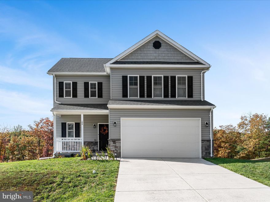 Step into this 1.5 yr old home home nestled in the desirable Middle Creek Vistas community of Inwood. Built in 2024 by Warfield Homes Inc., this modern colonial-style features approximately 1,900+ sq ft above grade, 3 bedrooms, 2.5 baths, and a full unfinished walk-out basement ideal for future expansion including a rough-in for a bathroom.
From the welcoming front porch — perfect for seasonal décor and relaxing evenings — you enter into a bright open plan accentuated by 9′ ceilings and luxury vinyl plank flooring. 

The gourmet kitchen shines with stainless steel appliances, soft-close cabinetry, and upgraded countertops — a space that’s as functional as it is beautiful. 

Upstairs, find a spacious primary suite, two well-sized secondary bedrooms, an upstairs laundry room (for convenience), and a versatile multipurpose loft area — perfect for a home office, media room or play area. 

 Outside, the deck and woodland/garden views at the rear of the lot invite peaceful evenings and outdoor entertaining. 

Additional highlights include a water treatment system by Culligan, owned not rented.  Custom plantation shutters and blinds in each room.  Garage has custom built shelves to allow for extra storage of seasonal items.  

 The community carries a modest HOA fee of about $400 annually currently managed by the builder.

Seller relocating for work; don’t miss this excellent opportunity to make this turnkey home your own.