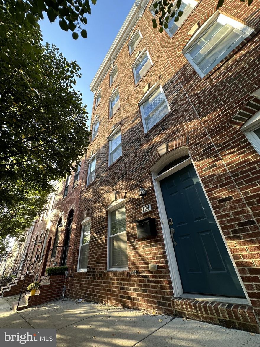 Come check out this gorgeous 4 bedroom, 4.5 bathroom row home.  This home is fully renovated and includes additional features including; a 2 car garage plus additional off street parking, roof top deck with the most stunning view of Baltimore City, hardwood flooring, crown molding, large island counter top, stainless steal appliances, ceilings fans, wet bar, and living/dining room open floor plan. Finally, this home is just blocks away from Riverside Park, local bars, local restaurants, and a 15 minute walk to downtown. We are ready for a family or room mates to move in immediately. Come check out this property before it's gone!