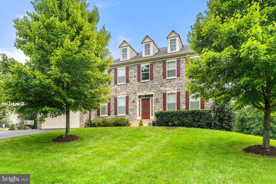 Welcome home to 7202 Freemont Hill Court, located in the desirable Reserve at Jamison's Farm. Don’t miss your opportunity to own this incredible home that has been meticulously cared for and customized by its original owners! This stunning turnkey stone front 2 car garage property is situated on .92 acres offering you plenty of front and private back outdoor space. Just over 5,600 sqft, this spacious luxurious home features 4 bedrooms, 4.5 bathrooms, includes a Trex deck and many impeccable upgrades throughout. A captivating two-story foyer greets you as you enter the main level of the home. The spacious family room is adorned with a coffered ceiling and a lovely stone fireplace. Beautiful hardwood flooring covers most of the main level. Trimmed out windows and molding are present throughout. Custom window shutters are also located throughout the property. Additionally, select windows on the main level are equipped with UV protection. The generous sized gourmet kitchen includes double ovens, stainless steel appliances, upgraded cabinets with crown molding finish, custom knobs and pulls, a spacious island, granite countertops and a Butler’s Pantry. Beautiful custom 8 Ft. French doors are located throughout the entire main level. This level also showcases a dining area, laundry room, and an office/den. Dual staircases take you to the upper level, which boasts 4 bedrooms and 3 bathrooms. The massive owner’s suite features elaborate tray ceilings, a separate sitting area and is also equipped with 2 spacious walk-in closets. The bathroom in the owner’s suite contains upgraded tile, dual stone countertops, and upgraded cabinetry with custom knobs and pulls. The additional bathrooms on the main level and upper level of the property also include upgraded tile and upgraded cabinetry with custom knobs and pulls.  The enormous walk out basement features a full bathroom, family room and an additional unfinished room. This home has been very well-maintained with many items still under warranty. The 75-gallon water heater was installed in 2018 and has a remainder of 6-year warranty on it. HVAC has a UV system on the lower level with the UV system having a 3-year warranty from May 2021. UV bulb was renewed in June 2022. HVAC was last inspected in June 2022. New roof was completed in June 2022. Roof is under 50-year warranty on material, labor, tear off and disposal. Workmanship warranty is 25 years. Property also contains a high-water septic alarm, a 7 zone irrigation system and wildlife deterrent. The exterior features an alternative septic system with peat moss with annual inspections, multiple extended downspouts and sump pump drainage away from the home and a 7-zone irrigation system. Buyer will be offered up to a 1-year home warranty on appliances, HVAC, electrical and plumbing. Close to Old Town Warrenton and many other shopping, dining and outdoor recreation.