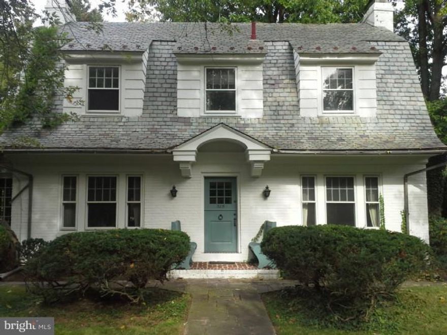 Country style estate in the suburbs. Great location convenient to schools, shopping and major roadways. This colonial style, turn of the century charmer offers the best of old world craftsmanship, yet with updated features throughout. The home even features a split Dutch style front entry door for added charm. Come see this custom built home on an oversized half acre plus wooded corner lot. Privacy, yet in a suburban setting. The home features four generous sized bedrooms, and two and a half modern ceramic tile baths. Second floor Master bedroom suite, has a full private bath and ample storage. Second and third bedrooms, also on second floor, share a full tiled bath. Powder room is on the first floor just off the library/office/optional first floor bedroom. All bathrooms are updated, clean and bright. Modernized kitchen with all appliances included and first floor laundry offer views and quick access to the rear and side yards. Expansive first floor library/home office doubles as optional first floor bedroom with private entrance and has hardwood floors and bright open window views of private backyard. This home features a central hall entry, stairway with carved balistrade, hardwood floors throughout, and true wood-burning fireplace in living room. A new oversized two car plus, Dutch/Gambrel style, story and a half garage with private off street parking for four cars, adds value and ease for the right client. All these features set on a park-like corner lot with mature trees and shrubs. Stone patios, rear covered porch, and small reflecting pool add scenic points to this estate property. Call now for an appointment to see this great home.