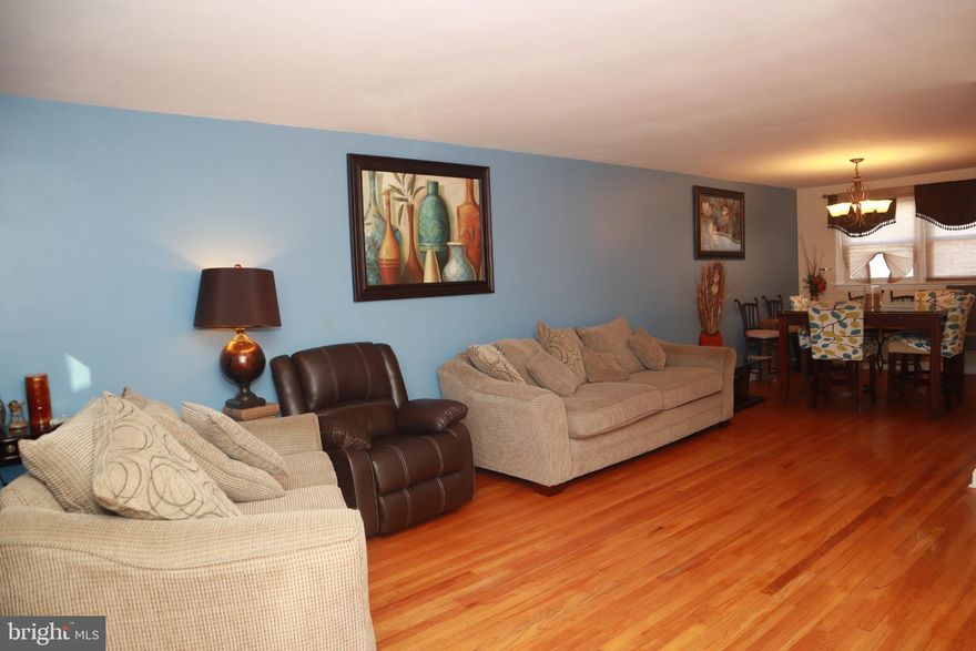 Welcome to 4628 Parkside Dr, nestled in Baltimore’s Parkside neighborhood. This classic 3BR/1.5BA row home blends vintage charm with modern touches: rich hardwood floors flow through the open living areas, and the bright blue kitchen cabinetry with stainless steel appliances adds a cheerful, updated vibe. Priced at $175K, this home is an amazing value in an area where row homes typically sell between $150K–$200K. Parkside is a quiet, tree-lined community adjacent to Herring Run Park
 and just  4 miles from downtown Baltimore (Inner Harbor) —offering suburban ease and quick city access.

Inside, a sunlit living/dining area is spacious enough for family gatherings, and the vibrant kitchen invites easy meal prep and bright morning starts. Upstairs, the roomy bedrooms feature hardwood floors and ample closets, ready for your personal touches. While the home shows pride of ownership, first-time buyers will appreciate the sweat-equity potential – a fresh coat of paint or updated fixtures can instantly boost its value. Savvy investors will note the strong rental upside (roughly $1,200+/mo per local estimates and the nearly turnkey condition for renters. Added bonuses include a fenced backyard patio and two-car parking (driveway + off-street), making 4628 Parkside a smart buy for both homebuyers and landlords. Don’t miss this friendly, affordable opportunity – schedule a showing today and see the potential for yourself!