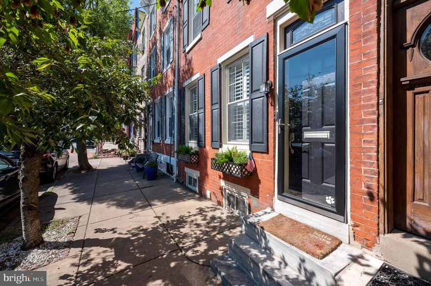 Welcome home to 2211 Aspen Street! Located in the heart of Fairmount, this 3 bedroom, 2 bathroom brick townhome is a neighborhood gem. Upon entering the front door, you will be greeted by a sun filled, 16 foot wide, spacious first floor. The combination living and dining room offers plenty of space for entertaining. The kitchen has ample counter space, plenty of storage, stainless steel appliances, and a breakfast nook. Off of the kitchen, a sliding backdoor leads to a small garden oasis featuring a Philadelphia mural. The original details of the millwork can be seen throughout the home including the staircase. Hardwood floors run through the living and dining room as well as the second and third floor. The second floor has two spacious bedrooms and a renovated hall bath with a soaking tub and large storage closet. On the third floor, you will find a large bedroom that has skyline views of Philadelphia and a spacious walk-in closet. Completing this suite, you will find a renovated primary bathroom with a walk-in tile surround shower. Laundry is housed in the unfinished basement with additional storage space. A new roof,  new HVAC system, fresh paint, and a new washer and dryer make this house truly move-in ready! 2211 Aspen Street is directly across the street from the "tot lot" park and the weekly Fairmount farmers market. Just a quick walk to Kelly Drive, playgrounds, Whole Foods, Fairmount shopping and dining, and center city. Don’t wait to call this house your home!