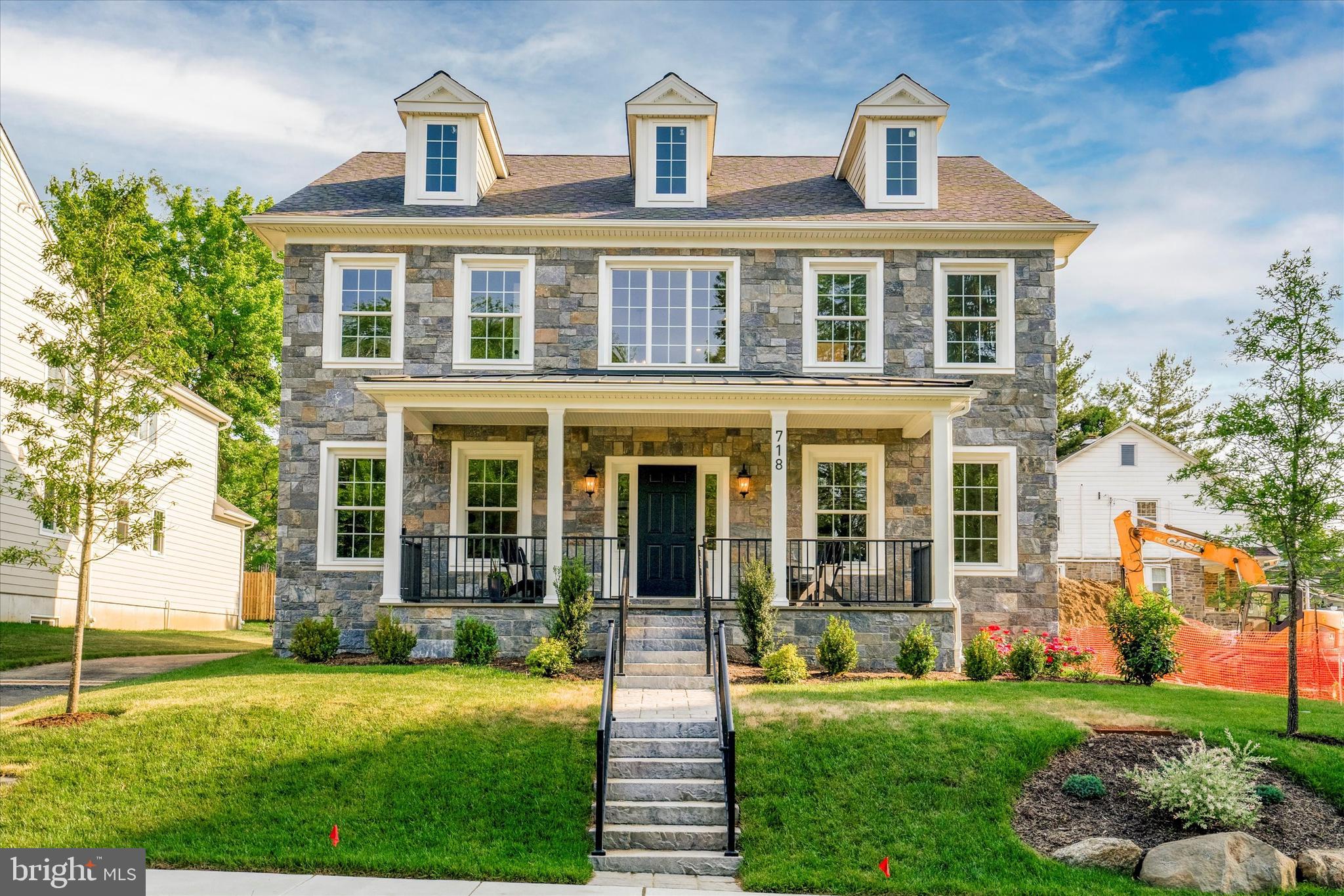 Last available 2023 delivery at the Homes at Willow Way! Enjoy the Summer in this rarely offered new construction home in Penn Valley within walking distance to the village of Narberth, Merion Station and easy access to Center City, Philadelphia all in top ranked Lower Merion School District. Custom built by Vintage Development, 718 Willow Way combines classic Main Line charm with a modern floor plan and finishes that are sure to please. Custom cut fieldstone from top to bottom on the exterior front and a large and welcoming flagstone front porch gives this home striking curb appeal. The interior Center Hall floor plan starts with a gorgeous 2 story open staircase with oak treads and an abundance of natural light. A large, formal living room is next to the entry and offers crown molding, oversized baseboards and large, bright windows. The formal Dining Room is also adjacent to the entryway and will be a special place for occasions big and small and memories to be made. This wonderful gathering space has custom wainscoting, room for a large table and access to the Butler's pantry. Through the pantry is the heart of the home starting with the large deluxe kitchen with center island. This gourmet kitchen is a chef's dream that includes gorgeous Century Carriage House cabinetry, Quartz countertops and top of the line GE Monogram PRO series appliances. Open to the kitchen is the large and inviting family room space with custom built-in shelving and mantle, direct vent gas fireplace and large oversized windows for great natural light. Enjoy indoor/outdoor living with access to the large composite deck perfect for entertaining. Off the kitchen is the huge mudroom with more built in shelving and custom built cubbies, Powder Room and access to the 2 car garage. Finishing off the first floor is a large, private study great for a home office on the first floor. Heading upstairs to the second floor, the layout is a treat starting with the grand primary suite. Vaulted ceilings in the bedroom, a massive walk-in closet with Top Shelf closet systems and a stunning spa like bath with a gorgeous soaking tub, Carrera tile and a beautiful walk-in shower. Floor plan continues with two large bedrooms (2 and 3) that share a Jack and Jill bathroom with bathtub and double sinks. A junior suite down the hall has it's own bathroom and walk-in closet. Rounding off the second floor is the ultra convenient second floor laundry room and pull-down attic access for additional storage. Need some additional living space? The finished basement offers great possibilities with a large living space perfect for a playroom, movie theater, game area and a second finished room with an oversized window, closet and access to the full bathroom. This bonus space could work as a 5th bedroom, 2nd office, gym or great au pair suite. Top notch construction and materials throughout, only one property remains for a 2023 move-in. Location affords walkability to the shoppes and train of Narberth, the gem that is General Wayne playground, the esteemed Penn Valley Pub and so much more.