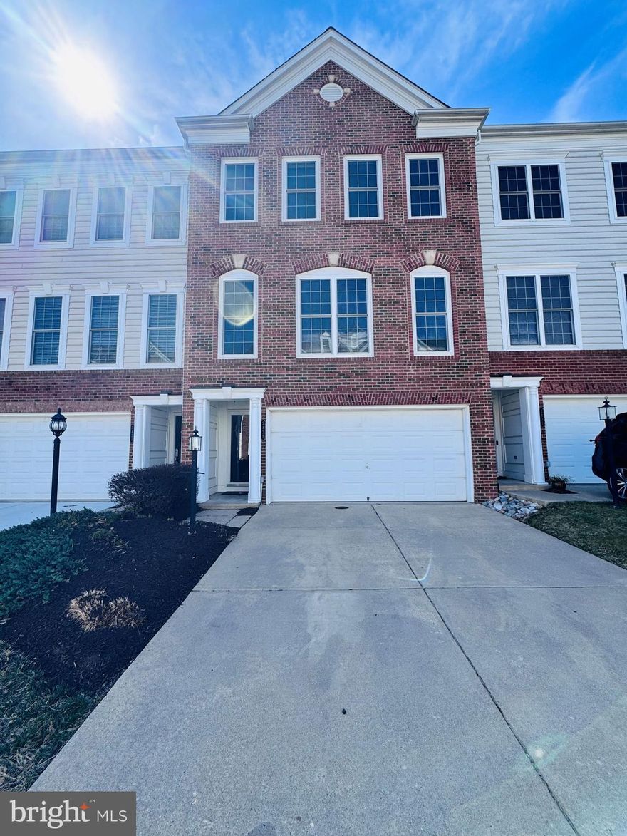 Magnificently decorated and meticulously maintained, this home is situated in the highly sought-after Potomac Club neighborhood, Prince William County’s exclusive gated community! The owner has spared no expense, with upgrades throughout! Upon entering, you are greeted with a welcoming foyer that leads you into this multi-level stunner! Go up the stairs and the wall of windows in the sunroom and kitchen will wow you!   The upgraded kitchen boasts a stunning backsplash, newly refinished cabinetry, new kitchen faucets, beautiful stainless-steel appliances, and soaring ceilings! Moving up another set of stairs, the next level features the living and dining rooms, complete with gleaming hardwood floors, a second wall of windows, and a gas fireplace!  Continuing upstairs, you will find more newly installed hardwood floors on this entire upper level! The laundry is conveniently located here, along with an extra-large primary bedroom! Enter into your primary bath through the beautiful barn door and take in this designer's dream...a completely remodeled spa-like primary bath! It boasts a beautiful free-standing tub to relax in after a long day, a double vanity sink, and a lovely walk-in shower with a frameless shower door!  The other two bedrooms and full bath will not disappoint.  Heading downstairs to the lower level, you are greeted by a warm carpeted family room with a walk-out to your new concrete patio!  You will also find a gorgeous home office with new French doors and plenty of natural light! Lastly, the home features a large two-car garage and double-car driveway! The Potomac Club community includes a year-round indoor lap pool, fitness center, sauna, playgrounds, outdoor pool, multi-purpose courts, and clubhouse. Walking distance from Stonebridge Potomac Town Center, Sentara Medical Center, and Neabsco-Potomac Commuter Garage (Prince William County’s first commuter garage). Only minutes from Potomac Mills Mall, I-95, and Rippon VRE. You'll love to call this home!