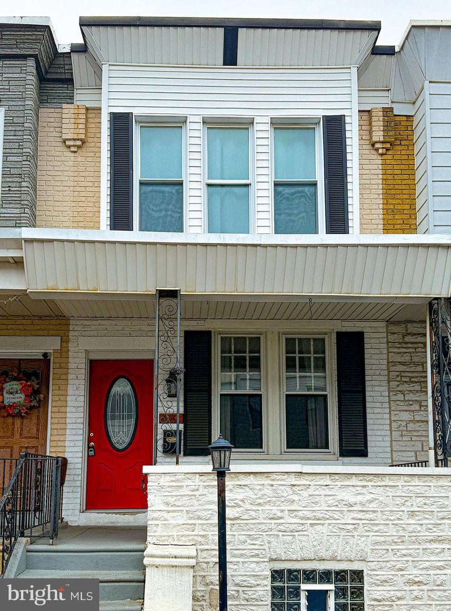 This beautiful well-updated Port Richmond home is just the one you've been looking for! Step inside from the sizable front porch, looking out onto a LOT of parking areas on a wider street - once inside the nicely finished hardwood flooring gives you that classic look mixed with an updated/upgraded feel - check out the high ceilings, upgraded fixtures, the exposed brick chimney, the BATHROOM on the first level (seriously - hard to find as you know!) a main floor laundry room (also hard to find!), and then the kitchen - wow. Beautiful dark wood cabinets, stainless appliances, solid-surface counters, under cabinet lighting...its got it all!! Move upstairs, you'll find three nice-sized bedrooms, the primary with lots of windows and closets, and beautiful pine flooring to complement!! Additional bedrooms as well, one with a murphy bed that stays! The full bath upstairs - nicely refinished with brick, a large vanity, shower and tile flooring! The unfinished basement gives lots of options to refinish as well, and over 600sf of additional storage or living space! The outside rear year is private, fenced in with concrete/no maintenance! This place has it all - including CENTRAL AC!! What are you waiting for? Make it yours!!