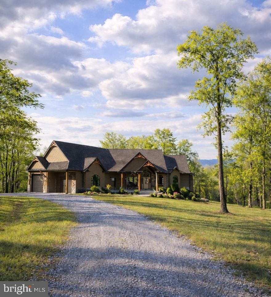 Welcome to 20 acres of “we have officially made it.”

Panoramic mountain views that stretch for miles — the kind that make your friends go silent when they walk in and then immediately ask, “Wait… how much did you say this was again?” (Under appraised value. You’re welcome.)

This custom-built estate sits on TWO separately recorded 10-acre parcels. That’s 20 acres total. Translation: if you can see your neighbor, they’re probably a deer.

Parcel one includes the main house, a guest house, lake frontage, and enough serenity to lower your blood pressure just by pulling into the driveway.

Parcel two is fully buildable with a 4-bedroom perk and the ability to construct a primary home and a second dwelling. So yes — family compound, multi-generational setup, private retreat, or a strategic Airbnb situation are all firmly on the table.

• A family compound
• multi-generational setup
• A “kids stay here forever” setup
• A retreat situation
• A strategic Airbnb situation

We’re not judging. We’re just impressed.

Located in Lake John Estates with private river access — meaning fishing, kayaking, wildlife watching, and children who actually go outside instead of asking for the Wi-Fi password every 12 minutes.

The main house was strategically positioned to maximize mountain views from nearly every window. Because if you’re going to live in the Shenandoah Valley, you do not face the wall. We don’t do that here.

Expansive windows. Rolling ridgelines. Vibrant treetops. A stacked-stone double-sided fireplace that says, “Yes, we drink good wine now.”

The gourmet kitchens features high-end appliances and a window so beautiful it may cause sudden bursts of voluntary dishwashing. Even microwaving leftovers feels luxurious.

The owner’s suite is what happens when a spa and a mountain lodge fall in love. Private porch access. Heated floors. A bath that makes you cancel weekend plans.

The finished basement has nine-foot ceilings — because this is not a “duck and pray” basement. It’s a “host Thanksgiving and still have space for the cousins” basement.

Now let’s talk about outdoor living.

An 8x12 ft multi slide door opens completely to a massive covered Trex deck with a stone wood-burning fireplace. Translation: football parties, fall evenings, summer sunsets, and dramatic winter cocoa moments.

There’s a pool with mountain views. A hot tub for when you want to pretend you’re at a resort but also still own it. Which you do.

Function meets preparedness:
Oversized 2-car garage. Generator hookup. Full RV hookup. Electrified storage shed.
Basically, if the power goes out, you won’t even notice.

The guest house? Oh, it’s not cute. It’s “why does this feel nicer than my first apartment?”

One bedroom. Gourmet kitchen. Clawfoot soaking tub. Walk-in shower. Custom closet. Jacuzzi hookup.

Guests may extend their stay indefinitely. Choose wisely who you invite.

Wildlife? Deer. Waterfowl. Peace and quiet.
Outdoor target shooting area? Yes.
Fishing and kayaking? Obviously.

This isn’t just a home.
It’s a legacy estate.
A private retreat.
A compound.
A “we should’ve done this years ago” situation.

Luxury. Land. Waterfront. Flexibility.
All wrapped into one mountain-view masterpiece.