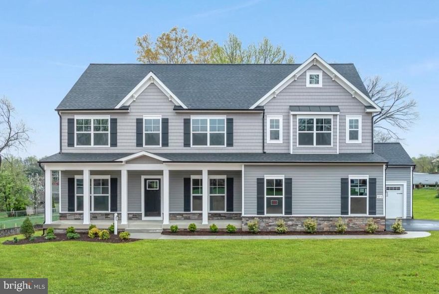 Experience the perfect blend of craftsmanship, comfort, and convenience in this brand-new luxury home by SONA Homes, now move-in ready in the Town of Warrenton. Thoughtfully designed and meticulously built, the Churchill II model offers a bright, open layout with timeless curb appeal and modern finishes throughout—ideal for everyday living and entertaining alike.

Set on a 0.7-acre homesite with no HOA, this home delivers the rare combination of space, privacy, and proximity to downtown Warrenton’s shopping, dining, and historic charm. The covered front porch welcomes you inside to a light-filled main level featuring wide-plank LVP flooring, tall ceilings, and designer lighting. The gourmet kitchen anchors the heart of the home with granite countertops, stainless-steel appliances, a large island, and 42" soft-close cabinetry. The kitchen opens seamlessly to the spacious family room with a gas fireplace, while a dedicated dining area and powder room add function and flow.

Upstairs, four generous bedrooms provide space and versatility for today’s lifestyle. The primary suite showcases a tray ceiling, dual walk-in closets, and a spa-inspired bath with a soaking tub, glass-enclosed shower, and dual vanities. Three additional bedrooms, each with ample closet storage, share two beautifully finished full baths. A convenient upper-level laundry adds ease to daily routines.

The partially finished lower level extends the living space with a large recreation area, full bath, and walk-out access—ideal for a guest suite, gym, or media room. A three-car side-entry garage and newly paved asphalt driveway provide plenty of parking and a clean, modern exterior. The level backyard offers endless possibilities for outdoor living—patio, deck, or garden space—all ready to make your own.

Built with precision and backed by a 2-10 builder warranty (1-year workmanship, 1-year mechanical, 10-year structural), this SONA Homes residence offers lasting peace of mind. Additional incentives include 1% closing-cost assistance when using the builder’s preferred lender.

With no HOA, a prime location minutes from downtown, and new-construction convenience without the wait, 575 Solgrove Road is your opportunity to enjoy the best of Warrenton luxury living—ready now. **Some photos have been virtually staged to help illustrate the potential use and layout of the spaces**