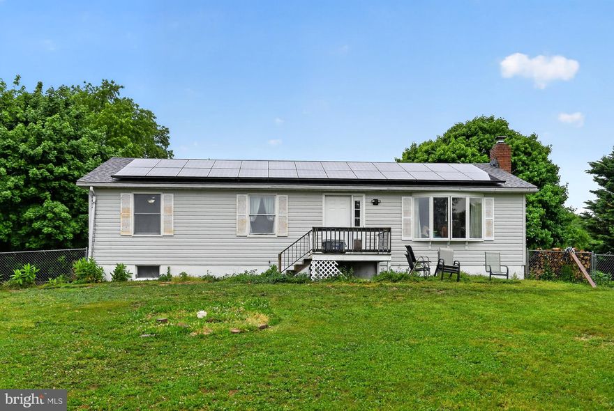 Welcome to your own slice of countryside charm at 2475 Mount Ventus Rd #2 in Manchester, MD! Nestled on a picturesque 3-acre lot, this inviting 3-bedroom home offers the perfect amount of comfort, functionality, and rural beauty. Step inside to find a beautifully updated kitchen, completely renovated in 2025 with all new appliances. The fully finished basement features a second kitchen—perfect for use as an in-law suite, guest space, or extended living area. A cozy woodstove adds warmth and character, while the electric baseboard Smart Home System provides modern convenience and efficiency.  Outside, enjoy peaceful country views and a property thoughtfully equipped for both relaxation and utility. Equestrian or hobby farm enthusiasts will love the two fenced pastures with run-ins, a 2-stall barn, and even a chicken coop that conveys with the property. A spacious 2-car detached garage with a workbench offers plenty of room for projects and storage, and there’s a working, accessible 50-amp electric hookup—ideal for a camper or future hot tub. Additional updates include a new well pump installed in 2025 and a new water heater in 2026, providing added peace of mind.  Whether you're seeking a quiet retreat, multi-generational living, or a property ready for your homesteading vision, this unique home offers the best of Carroll County living with room to grow.