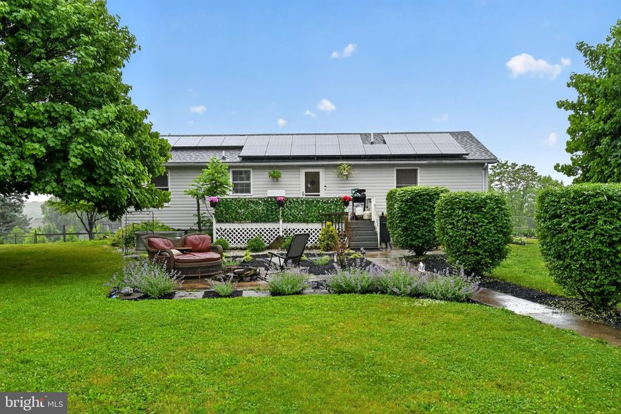 Welcome to your own slice of countryside charm at 2475 Mount Ventus Rd #2 in Manchester, MD! Nestled on a picturesque 3-acre lot, this inviting 3-bedroom home offers the perfect amount of comfort, functionality, and rural beauty. Step inside to find a beautifully updated kitchen, completely renovated in 2025 with all new appliances. The fully finished basement features a second kitchen—perfect for use as an in-law suite, guest space, or extended living area. A cozy woodstove adds warmth and character, while the electric baseboard Smart Home System provides modern convenience and efficiency.  Outside, enjoy peaceful country views and a property thoughtfully equipped for both relaxation and utility. Equestrian or hobby farm enthusiasts will love the two fenced pastures with run-ins, a 2-stall barn, and even a chicken coop that conveys with the property. A spacious 2-car detached garage with a workbench offers plenty of room for projects and storage, and there’s a working, accessible 50-amp electric hookup—ideal for a camper or future hot tub. Additional updates include a new well pump installed in 2025 and a new water heater in 2026, providing added peace of mind.  Whether you're seeking a quiet retreat, multi-generational living, or a property ready for your homesteading vision, this unique home offers the best of Carroll County living with room to grow.
