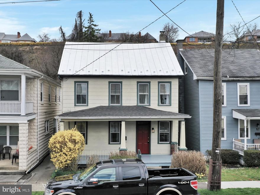 An offer has been received.  Seller is asking for highest and best by Friday at 2pm.   Affordable traditional home with large front porch and level rear yard on the West Shore!  This classic home features three bedrooms with one and a half baths , hardwood floors, central air and ceiling fans throughout.  There is a fresh coat of paint.  The kitchen features a gas stove with dishwasher and garbage disposal.  This home is an easy commute to anywhere and just a stone's  throw from City Island and local restaurants and area attractions.