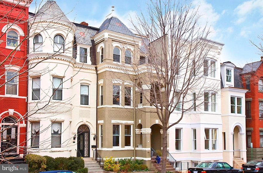 STUNNING  4,000 Sq Ft* residence on important cobble stone street features  11-ft ceilings, three fireplaceS,  gourmet Kitchen open to Family Rm, LARGE LR AND DR, 4 BR upstairs plus an Office, 4.5 Baths, and spacious lower-level includes Family Room as well as In-Law Suite with Full Bath and Kitchenette. Luxe Master Suite includes a fully updated Master Bath, large closets and south-facing balcony. Two Parking spaces.  Two blocks to shops, restaurants and Volta Park. *Total Square Footage Per DC Tax Record