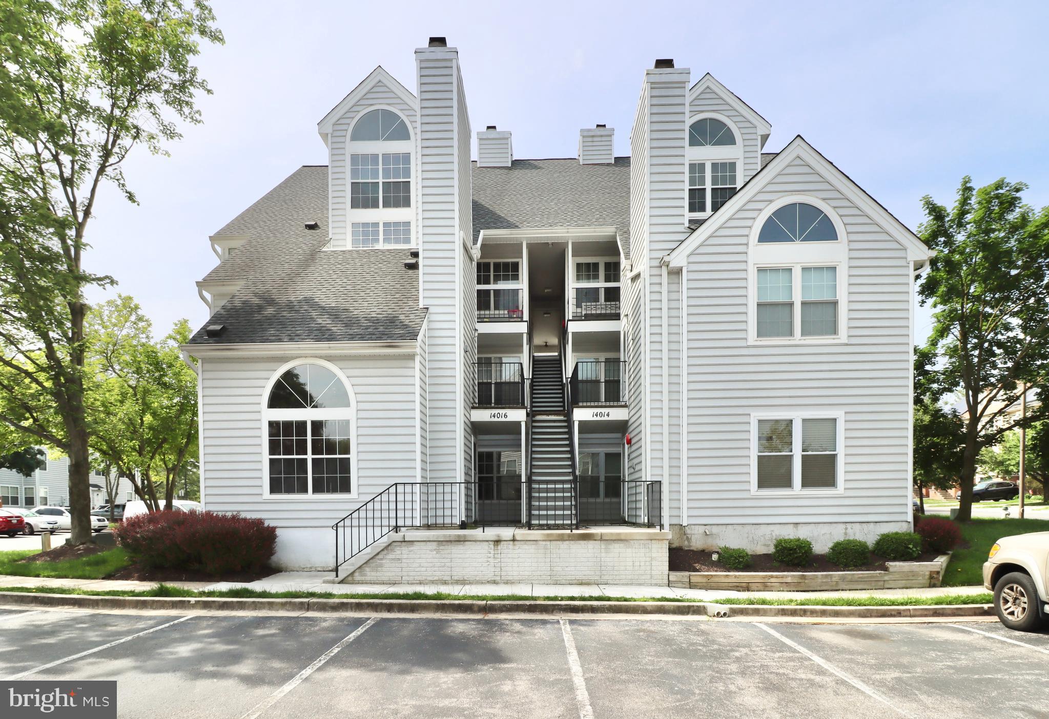 Welcome to unit 13A at 14016 Vista Dr, a beautiful and spacious 2 bedroom condo with 2 fully renovated bathrooms in The Vistas at Laurel Lakes community! Enter to gleaming hardwoods, vaulted ceilings, and ample natural light coming through the large windows. Enjoy the open feel of the living space, kitchen, and dining space. Kitchen is complete with breakfast bar and SS appliances. Primary bedroom includes walk in closet and en-suite renovated bathroom. Secondary renovated bathroom accessible via the hallway. 3 parking passes come with the unit. Brand new washer & dryer in unit.