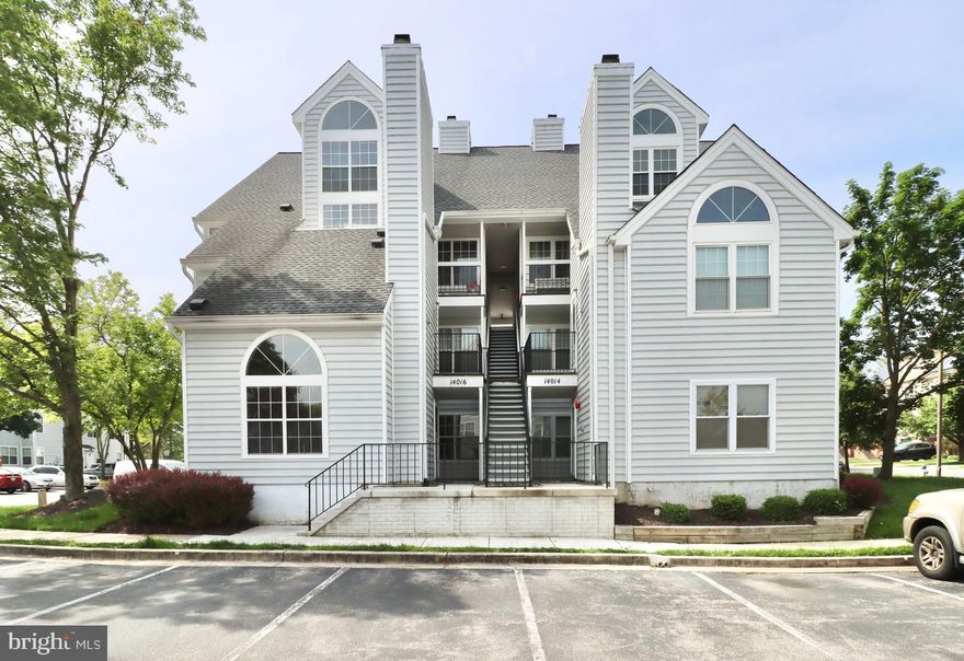 Welcome to unit 13A at 14016 Vista Dr, a beautiful and spacious 2 bedroom condo with 2 fully renovated bathrooms in The Vistas at Laurel Lakes community! Enter to gleaming hardwoods, vaulted ceilings, and ample natural light coming through the large windows. Enjoy the open feel of the living space, kitchen, and dining space. Kitchen is complete with breakfast bar and SS appliances. Primary bedroom includes walk in closet and en-suite renovated bathroom. Secondary renovated bathroom accessible via the hallway. 3 parking passes come with the unit. Brand  new washer & dryer in unit.