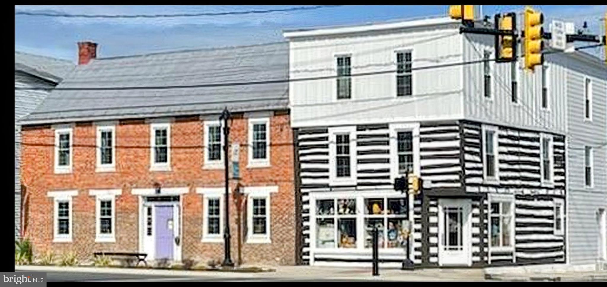 Approx. 2,600 SF of prime retail space available in a charming historic building located on a high-traffic corner in the heart of Strasburg. The main level offers two distinct commercial spaces showcasing original character, including exposed log and brick walls, fireplaces, and rich wood flooring. Exceptional visibility at a main intersection makes this an ideal location for a variety of businesses. Rare opportunity to lease in one of Strasburg’s most iconic buildings! Owner would be open to renting the spaces separately.