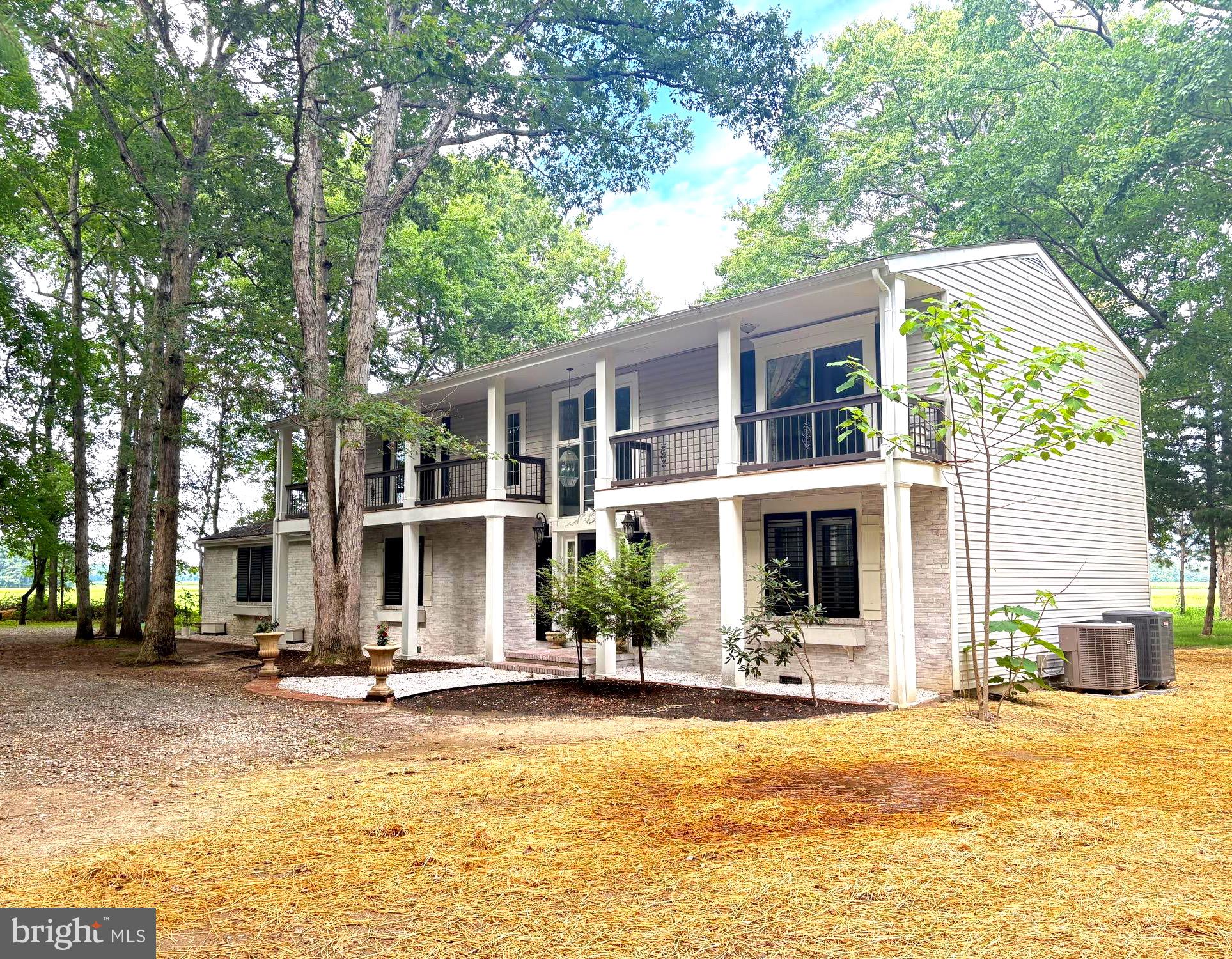 Welcome to Triple Oaks! Enjoy the serenity of country living just minutes from downtown Easton and Cambridge! This spacious, 2.5-bath home offers over 3,400 square feet of living space and sits on nearly an acre (.9647) with sweeping views of open fields.
The home features a new roof, a new well, and a new septic system (installed in 2025), along with updated flooring in the kitchen and breakfast area. Additional flooring throughout the house includes wood, laminate and tile. The main level features three additional spacious rooms for your use at your discretion to meet your living needs. One of the large rooms, featuring a lovely brick fireplace, offers ample space for entertaining or simply relaxing. Or enjoy the unobstructed views of farmland. Relax and enjoy the outdoors from the 228 sq. ft. covered front porch or rear deck. Also, you have a spacious attached 475 sq. ft. garage with a circular driveway. The house is well situated off the main highway, with a driveway surrounded by mature trees for privacy and quiet living. This solid house offers a comfortable layout on both levels.
This is a rare opportunity to own a beautiful home with excellent commuter access and a touch of rural charm. While convenient for shopping and restaurants located in Trappe, Easton, and Cambridge. Medical faculties are in both Talbot and Dorchester Counties, all within 10 to 15 minutes. Please call for a personal viewing; a 24-hour notice is required.
Note that the assessment has not been updated since the home was updated. New assessment every 3 years