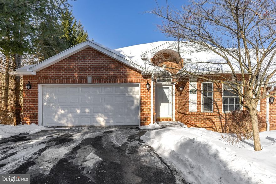 OPEN HOUSE - Sunday, February 15th, 2:00 - 3:30 PM.  Welcome home to Ridgefield Terrace community to this beautifully designed ranch-style condo offering luxurious main-level living and exceptional additional space. The main level features a large and comfortable owner’s suite with a large walk-in closet, professional closet organizers in each bedroom, a wet spa ensuite bath with an oversized steam shower. There is an additional bedroom which would make a great light-filled office, another full bath, rich hardwood floors, recessed lighting throughout, and beautiful sunlight streaming through the many windows. The kitchen is well-appointed with stainless steel appliances and granite countertops, and two convenient pantries. The spacious living room opens to a light-filled sunroom with vaulted ceilings and a striking two-sided fireplace. A door leads to a covered patio, perfect for relaxing or entertaining. 

The finished lower level offers approximately 1,300 square feet of additional living space, including two family room areas, two bedrooms, a full bath, and a private dry sauna. Additional highlights includes; radon mitigation, Culligan water treatment system, and a large two-car garage with shelving. The basement is walk-out to a nice patio area for grilling and chilling! The condo fee covers water, sewer, trash, lawn maintenance, and snow removal. Conveniently located near shopping, schools, and everyday amenities, this thoughtfully designed home blends comfort, convenience, and timeless appeal.