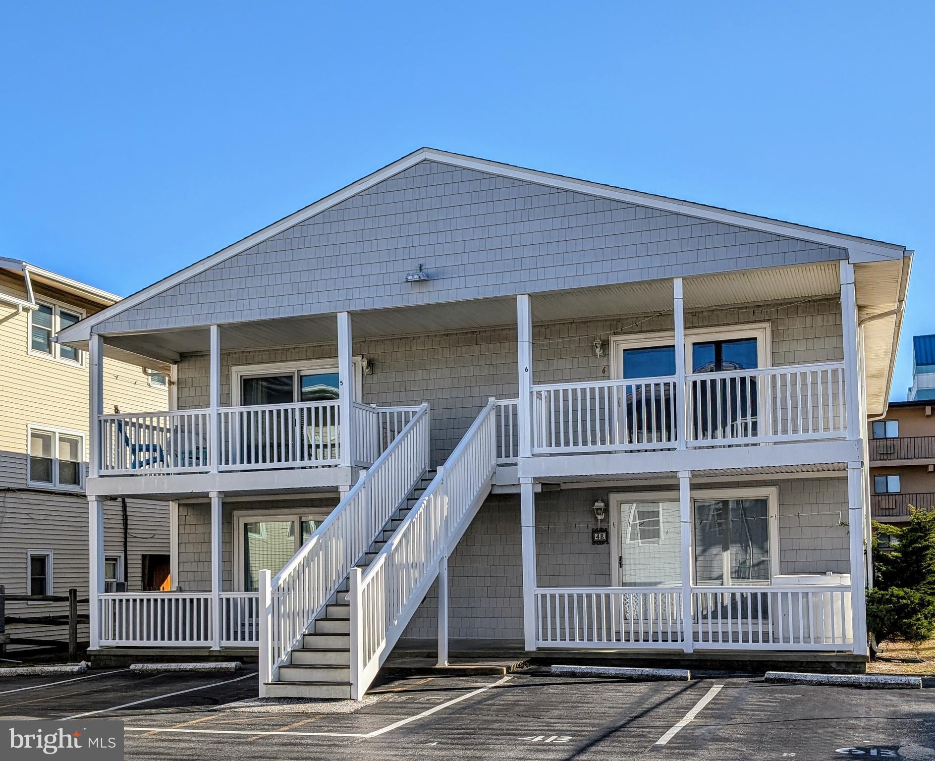 Spacious 2 Bedroom 1 and half bath oceanside unit. Close to restaurants, night clubs, shopping and even miniature golf, but still a short walk to beach. New flooring . Great mid town location, less crowded beach, and more rental potential.