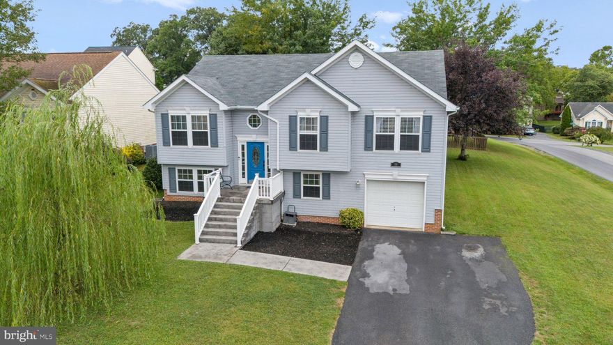 Welcome to the desirable Laurel Ridge Subdivision, where this well-maintained 5-bedroom, 3-bath home with over 2300 sq ft sits on a corner lot. The main level features a spacious living room, a bright kitchen with stainless steel appliances, a primary bedroom with a walk-in closet,  an ensuite boasting dual vanities, a walk-in shower, and a soaking tub.  The main level is completed by two additional bedrooms, a full hall bath, and an updated laundry area. The lower level offers two more bedrooms, a flexible space perfect for a family or rec room, and a spa-like full bathroom. Freshly painted, this home is move-in ready. Outdoor living includes a large front porch, a back deck, a stamped concrete patio, and a privacy-fenced backyard.  Recent updates provide peace of mind for years to come, including a brand new HVAC/heat pump (with a 10-year warranty) that features a UV light that improves indoor air quality, professionally cleaned ducts, and a new sliding glass door. The water heater is just 2 years old, and the roof is approximately 5–6 years old. Conveniently located near I-81, shopping, and dining.