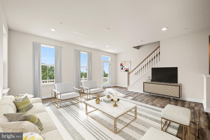 *February move-in!**  NEW SPECIAL PRE-MODEL PRICING, DON'T MISS OUT!!
Welcome to the fabulous Cambridge townhome. The entry level offers a 2-car garage and recreation room that can be used for any number of functions. Whether you need a home office, media room, playroom, or home gym - this space could cater to your needs! On the impressive main level, you will immediately notice the open and airy feeling. The kitchen features an abundance of cabinets topped with quartz countertops including a large island. Extended off the kitchen is a large composite deck, which is the perfect place for you to enjoy your morning coffee or favorite book. Back inside, there is a dining room for the nights you prefer a sit-down dinner or have guests to host.  Upstairs, you will find laundry at the top of the steps for convenience. The primary offers a walk-in closet and en-suite bath outfitted with dual sinks and a tastefully designed subway tiled shower. On the other side of this level are two secondary bedrooms that could easily be used as a guest room, craft room, or home office. A hall bath is nearby to ensure comfortability for all residents. 

**Photos of a similar floorplan in a nearby community. Options and upgrades will vary per homesite. Ask New Home Consultant for details.  Taxes to be assessed after settlement.*