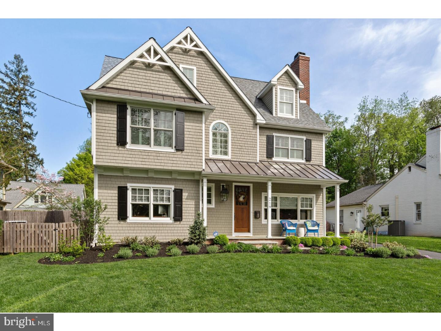 Stunning from top to bottom, this 6yr old custom home features high-end amenities complimented by stylish interior design & elegant decor. The entire interior has been professionally painted & decorated, bringing together the best elements of new construction & custom design in a premium location. Classic architectural lines on the exterior add to the story book setting of this North Wayne neighborhood. When you enter the home, natural light illuminates the foyer. Almost every window is fitted w/plantation shutters & crown molding and upgraded light fixtures can be found throughout this well appointed home. The living rm w/marble hearth & gas fireplace is an inviting space. First floor provides an open concept gourmet kitchen w/leathered granite countertops & island, matching Thermador appliances & built-in breakfast nook. Kitchen flows into the handsome dining room. First floor family rm w/coffered ceiling & finely crafted built-in bookcases has French doors that open to a professionally landscaped/hardscaped back yard w/slate patio & built-in fire pit. Detached garage w/2nd floor makes a great hobby room or more storage. Enter from the back door & you'll find built-in cubbies in the mudroom w/high-end Scalamandre wallpaper. A home office & powder rm complete the first floor. Basement was excavated to create a finished daylight space w/high ceilings, a rare find in "walkable" Wayne. Natural light shines in 3 egress windows illuminating basement family room w/built-in sound system for home theatre. This level includes a workshop, laundry, exercise rm, & storage closet w/rough plumbing for another full bath. On the second floor a spacious master suite showcases a walk-in closet w/island & another walk-in storage room. The master bath has marble flooring w/radiant heat & all baths throughout this exquisite home are decorated w/timeless finishes. Two more bedrooms & a full bath complete the second floor. The third floor offers two additional bedrooms w/generous closet space & access to attic storage plus another full bath. Located just two blocks from downtown Wayne & the Wayne Train Station, this home is positioned perfectly to take advantage of commuting by rail or enjoying the incredible restaurants & shops that have earned Wayne accolades as one of the Main Line's top places to live. If you're looking for high quality, low taxes & a move-in ready home, this is it!