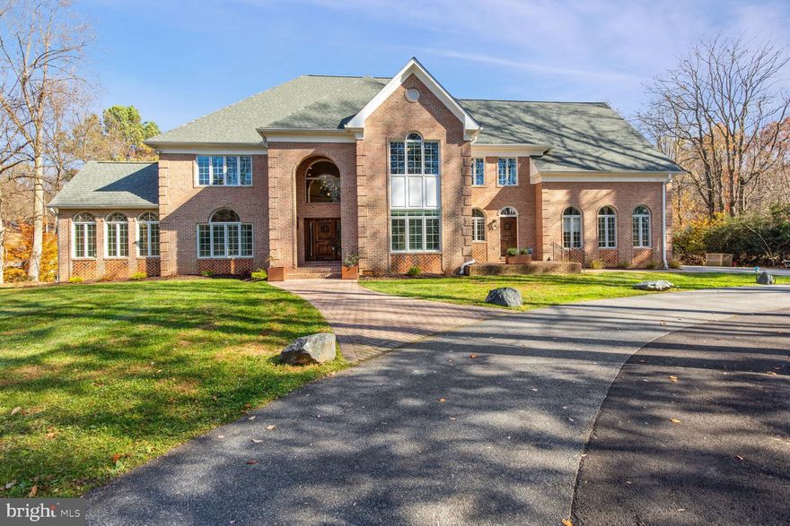 This custom-built home, sitting on 3+ acres is an entertainer’s dream. Enter the home to a spectacular 2-Story Foyer with a Palladium Window. On the Main Level is a Formal Living Room, Formal Dining Room and a Sundrenched Sunroom. A Full Bathroom next to an Office with doors leading out to the Screened Porch. A HUGE 2-Story Family Room with a wood-burning fireplace flanked by large windows allowing for plenty of natural light, built-in speaker system and French doors leading to the brand new custom designed deck. A Gourmet Kitchen featuring Stainless Steel Appliances, a Double Wall Oven, Built-In Microwave, an Oversized Refrigerator, Dishwasher, Cooktop and a 2-drawer beverage refrigerator in the Large Granite Island. Attached to the kitchen is an amazing butler's kitchen/wet bar with ice maker, sink and plenty of counter space. Perfect for all those parties. Also on the main level is a large Walk-in Pantry with plenty of shelves, cabinets and drawers, a Mud Room, a Half Bath and a Laundry Room with a utility sink and plenty of upper and lower cabinets and new (2021) Oversized LG Washer and Dryer. Travel up the curved staircase and you will find a Primary Suite with a private office, sitting room with mini fridge and sink, dressing area, his and hers walk-in closets and a very large primary en-suite with cathedral ceilings, spa-like soaking tub, modern walk-in shower with a rain shower, showerhead, custom cabinets, and palladium windows. Two generously sized bedrooms share a very large bathroom with double vanities and the 4th bedroom has an en-suite bathroom. The newly custom designed lower level (built in 2022) features a Theatre Room, Partial Kitchen, Full Bathroom, Family Room with Woodburning Fireplace and Billiards Room.  A Fifth bedroom can easily be created by adding a wall and a door. Out back you will find the custom-designed screened in porch including an outdoor kitchen with a built-in grill, grill vent, storage and refrigerator. A private area for the new hot tub, a steel-framed Custom Trex Deck installed by ProBuilt and featured in Deck Specialist Magazine (July/August 2023), featuring a 40x8 shipping Container Pool, built-in firepit and plenty of deck space for lounging during those Summer parties. There is also a large stone patio under the deck for even more outdoor entertainment space. If that wasn’t enough, there is a wildflower meadow with a slate stone trail that leads to a bonfire area with log seating and, last but not least, a Custom steel-framed Trex Treehouse (adult height) with electricity can be found outback next to a path that leads to the many miles of hiking trails. Updates include 2 HVAC systems (2020), New Well Pump, Washer & Dryer, Radon Remediation System, Culligan RO water filter under kitchen sink (2021) New windows in Sunroom, Bedrooms, Dining Room and Sitting Room (2022) Lower Level, Outdoor deck/porch/pool, Fence, Hot tub, Custom Treehouse, 2 Fireplace inserts and chimney lining and 2 hot water heaters  and New Septic System & Field (2022) Roof and HVAC for basement and main level sunroom and office (2023) New Water Pressure  Tank (2024)