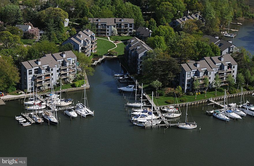 Charming one  - bedroom with sparkling water views on Spa Creek. Features gleaming hardwood floors, stylish finishes, and inviting open floor layout. This condo blends comfort with sophistication. Enjoy Relaxing Spa Creek views reading a book or nap on your private deck.  Nestled in a  sought-after water privilege community. All within a gated community.  Offering a marina with boat-slips, a waterfront pool with grill area, tennis, pickleball, racquetball, and oyster shell walking paths.  Granite countertops tops and stainless steel appliances in the Kitchen. Living room w/wood burning fireplace and a separate dining area, both with water views.
There are boat slips available, depending on size and water depth. The cost of $62 per foot of overall boat length per year. Most slips are 15-18 wide. Depth ranges 6-8 ft MLW. Power and water included. The marina includes 34 slips owned by the Shearwater Association, as well as 28 slips that are deeded to Condominium Owners. Other facilities owned by the Association include 13 spaces for dinghies and 42 spaces for kayaks. Electricity and water are available to all users of the marina facilities at no charge. Dinghies $195 per year - Kayaks $100 per year. LCE slip owners may also rent their slips to other condominium owners or tenants. Contact the Dockmaster for all information regarding resident and guest slip availability. Spa Creek is one of the most sought-after waterways in all of Annapolis, taking you to downtown Ego Alley. Perfect spot to watch the Parade of Lights in December, a tradition in Annapolis. Best of all, it's nestled along the waterfront, offering peaceful mornings and golden hour views and the kind of lifestyle that turns every day into a getaway. Come live and enjoy this wonderful waterfront lifestyle and AMAZING SUNSETS! Breathtaking at every turn, this condo is truly one-of-a-kind.