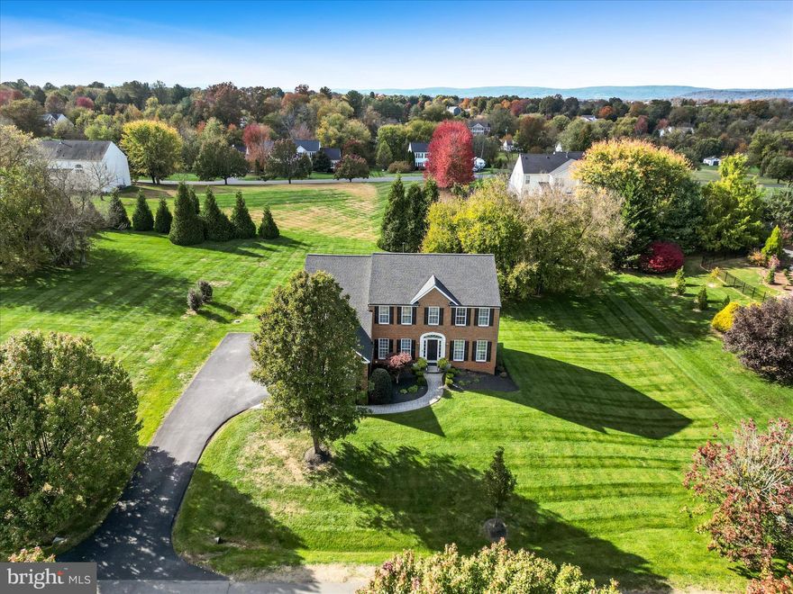 2 Open Houses this weekend, 2/7 & 2/8   11am - 1pm!! Welcome to 17301 Vannes Court, a beautifully located in the sought-after Hamilton Station Estates community. Set among tree-lined streets, mature landscaping, and meticulously cared-for homes, this property offers timeless charm paired with extensive modern updates.

The freshly painted interior features an open and inviting floor plan highlighted by custom three-inch baseboards and crown molding in all bedrooms, brand-new carpet on the stairs and throughout the upper level, and thoughtful design details throughout. The family room is centered around a cozy gas fireplace, while custom wood plantation blinds in the family and morning rooms add warmth and elegance.

The gourmet kitchen is designed for both functionality and entertaining, featuring a new KitchenAid gas cooktop with downdraft, new refrigerator and dishwasher, and seamless flow into the dining and living areas. A dedicated home office includes custom full-length white built-in bookshelves, providing a beautiful and functional workspace. The primary and secondary bathrooms have been updated with new countertops, sinks, fixtures, and fresh paint.

The fully finished walk-out basement offers exceptional additional living space, complete with a full bathroom featuring marble countertops, an additional room ideal for guests or recreation, and new storm French double doors leading outdoors.

Outdoor living is enhanced by a thoughtfully designed patio with wrought-iron railing, surrounded by mature trees and lush landscaping. Additional highlights include a three-car garage and a recently repaved driveway.

Major system updates include a new roof and gutters (2023) , two new HVAC units (2024), a new hot water tank, new toilets, and extensive interior updates completed throughout 2025 and 2026.

Conveniently located near Purcellville’s shops, dining, local coffee spots, and Route 7, this exceptional home offers comfort, craftsmanship, and peace of mind in one of Hamilton’s most desirable neighborhoods.

Landscaping for a year included!