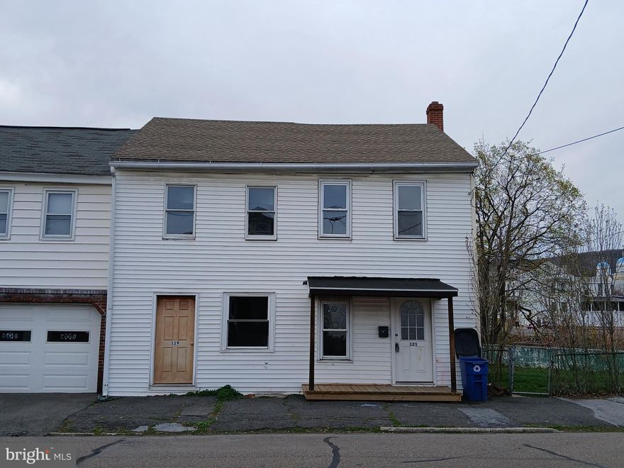 2 Unit Apartment Building in St Clair, PA.  Each unit is a 2 bedroom apartment.  The right side apartment is functional.  The left side apartment will need work.  One parcel/one electric service/ 2 units.  Sold as-is.  Cash sales only.   Owner is a licensed agent.  Call for details.