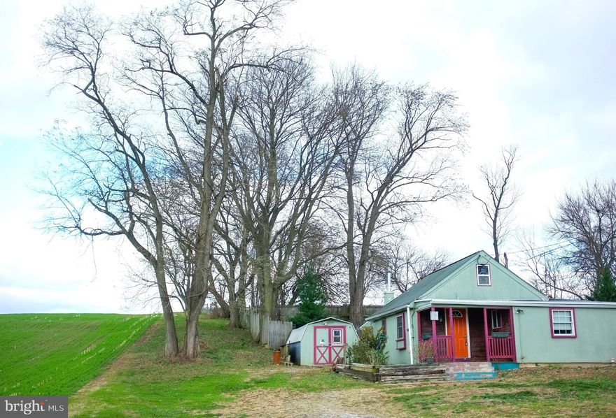 Located close to Lancaster City, Millersville, and Columbia, this 2-bedroom, 1-bathroom cottage sits on almost half an acre of land to enjoy. Large rear yard and a front yard with farmland views. Updated electric, vinyl windows, and a newer bath are inside. Home has a brand new boiler and new flat rubber roof. Inside the front door is a large living/dining area, kitchen, and 2 bedrooms in the rear.  The living room has a spot for a pellet stove, and access to the loft area, which could be more storage or additional room. This home needs updating, perfect for a buyer with a vision that loves the outdoors.