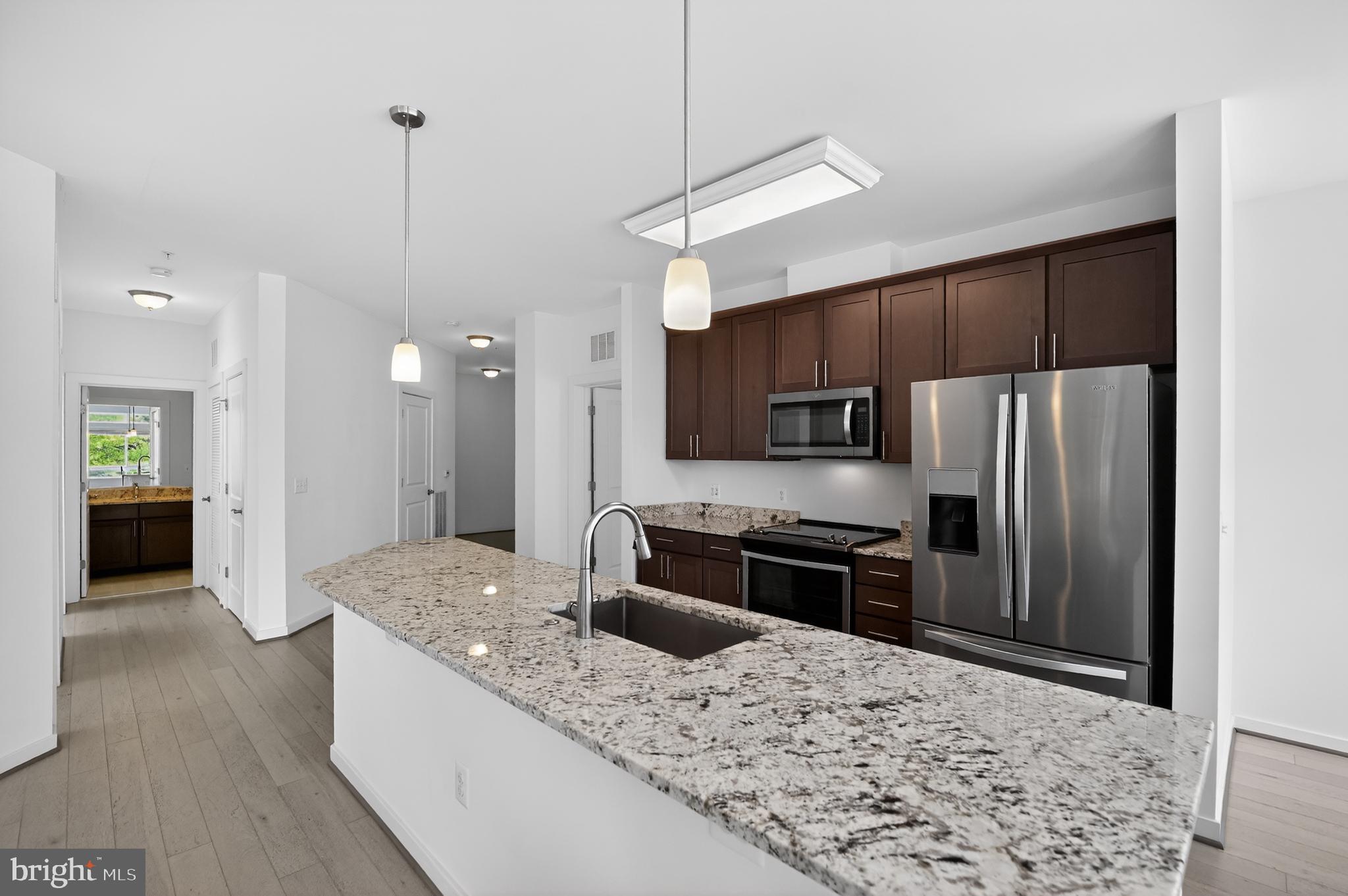9430 SILVER KING COURT 103