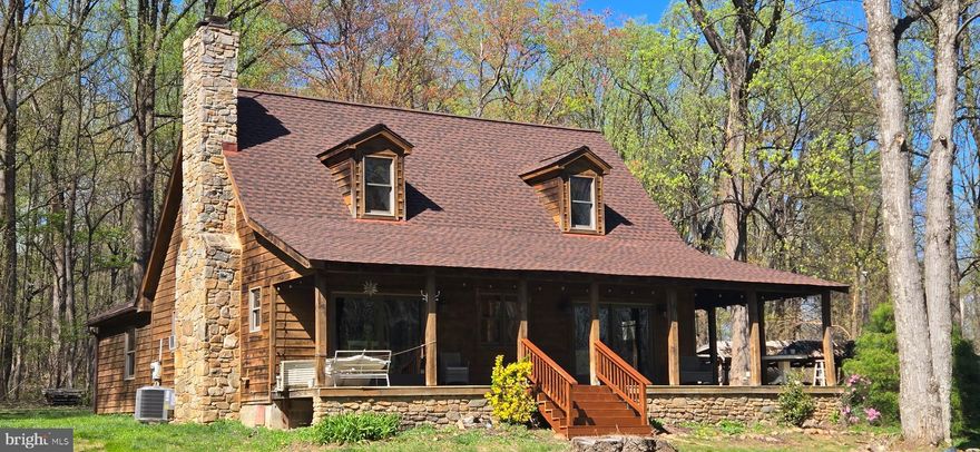 *** $74,000 IN RECENT IMPROVEMENTS ** 17.9 AC PARCEL ****COMPLETELY REFURBISHED & STUNING  LOG CABIN/LODGE STYLE HOME ON 17.RIV9 PATE ACRES SURROUNDED BY FOREST AND BACKING TO SHORT HILL MTN.   BRAND NEW ROOF, HVAC, SEPTIC DISTRIBUTION BOX, PAINT & CARPET AND $37,500 NEW ROAD TO PROEPRTY.  THIS AMAZING HOME IS TURNKEY READY.  LOVELY SETTING WITH ADITIONAL OUT BUILDINGS.  SOARING 2=STORY FAMILY WITH WOOD BURNING FPL. PRIMARY BEDROOMS ON BOTH THE MAIN LEVEL AND UPPER LEVEL. SPARKING WITH WILD LIFE AND HUNTING OPPORTUNITIES  ABOUND.  JUST 7 MINUTES FROM DOWNTOWN LOVETTSVILLE WITH EVERYTHING YOU NEED TO ENJOY REALLY COUNTRY LIVING.  MARC COMMUTER RAIL 10 MINS AWAY NEAR BRUNSWICK MD. 3 LEGAL BEDROOMS & 3 FULL BATHS  & UNIFINISHED WALKUP BASEMENT  - RUN-IN SHED, TOOL SHED AND FULL SHED.