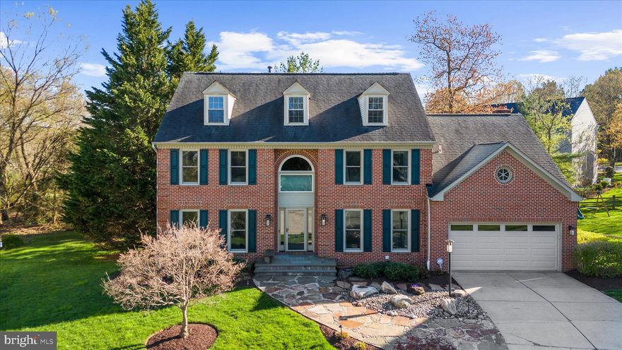 Tucked away on a peaceful cul-de-sac in desirable Burleigh Manor, this beautiful residence offers the perfect blend of comfort, space, and location—served by exceptional Howard County schools that are all very close by! A handsome brick front welcomes you inside, where timeless formal living and dining rooms provide an ideal setting for entertaining & versatile day to day living. The main level also features a dedicated study—perfect for working from home or enjoying a quiet retreat, a stunning remodeled kitchen with island & thoughtful bar / serving area opening to a warm and inviting family room centered around a cozy wood burning fireplace. Step outside onto the deck (new in 2021) & patio to truly unwind! Upstairs, you’ll find four bedrooms & two amazing renovated bathrooms (2020) that add a touch of modern luxury + California Closet interiors providing a refined & upgraded lifestyle. 
The finished, day lit walkout lower level includes a full bath, making it ideal for guests, recreation, or additional living quarters. The unfinished portion creates the storage & unstructured space that everyone needs.  Additional highlights include high-quality Andersen Renewal windows enhancing energy efficiency, level II EV charger in the garage, and a fun rear yard sport court. This exceptional property combines a tranquil setting with convenient access to top-rated schools, parks, and everyday amenities—an outstanding opportunity in a sought-after community.