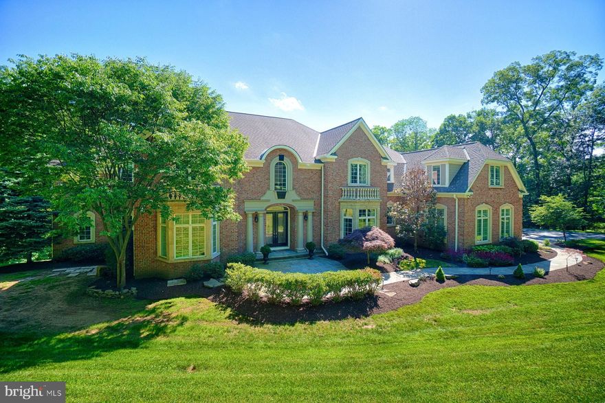 Welcome to your dream retreat! Nestled on a picturesque three-acre estate lot, this stunning Schultz custom home is surrounded by mature trees, offering unparalleled privacy and tranquility. The residence features a luxurious first-floor primary suite, which is complemented by an additional  primary suite upstairs, ensuring comfort and convenience for all. The recent basement renovation introduces a spacious bedroom, a sleek bath, a state-of-the-art workout room with glass doors, and a versatile craft/yoga room, perfect for all your wellness and creative pursuits. The heart of the home is the custom kitchen, adorned with high-end stainless steel appliances, designed for both the culinary enthusiast and the entertainer. Gather around one of the five fireplaces and create cozy moments in the two-story living and family rooms. Step outside to your personal oasis, where an infinity-edge pool offers a refreshing escape, surrounded by the natural beauty of the estate. This home effortlessly blends luxury with comfort, presenting an exquisite living experience that caters to your every need. Don't miss the opportunity to own this exceptional property, where elegance meets functionality in a serene, private setting.