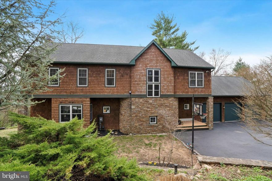 One step inside this home and you will be in awe of the view...  105 Shoen Road is a property where you're 5 minutes to everything but yet secluded on a beautiful 1.4 acre lot with privacy. Thoughtfully designed by renowned architect Sarah Susanka, if you want a home unlike any other, than this is the place for you! The main floor features built-ins and custom details everywhere you turn.  There is an abundance of windows providing natural light, showcasing the large living and dining spaces that flow well together. In the kitchen you'll find upgraded appliances, granite countertops, and plenty of space for hosting. The breakfast nook leads to a covered deck where you can sip your coffee and enjoy the sunrise.  Finishing out the main floor is a powder room, custom shelving closets, and a closed-off flex room that could be used as an office or playroom. Upstairs you'll find 4 bedrooms. The large primary bedroom has an en-suite bathroom, equipped with a walk in shower and jacuzzi tub. The primary walk-in closet was recently renovated by Closets By Design. 3 More bedrooms complete the upstairs with 2 of the bedrooms connected by a full jack-and-jill bathroom. The walk-out basement has everything you need and more. Featuring 1120 sq feet of finished space with 2 living areas, a bar, a full bathroom with a shower, PLUS a bonus room that could be a bedroom, office, workout space, play room- whatever you'd like! There is also a workshop and unfinished rooms for extra storage. Outside of the home there is much to explore. The oversized garage has 3 bays and a new circuit panel with a hookup ready for an electric vehicle. On the side of the yard you'll find a small barn and swing set. Follow the path to a rather large shed - perfect for ATVS, tractors, dirt-bikes, tools, whatever you want!  Don't forget to check out the recently installed beautiful stone grotto space underneath the deck for entertaining and watching the game with friends and family. This is truly worry-free living as the sellers spared no expense in upgrading behind the walls.  A whole house air scrubber purifier & humidifier,  2 zone HVAC system,  tankless water heater, upgraded plumbing and more. And of course you can't beat the desirable location in West Chester School District and low taxes... with every square inch carefully crafted... you have to see this home in person to truly appreciate it. Showings start Friday April 11th!