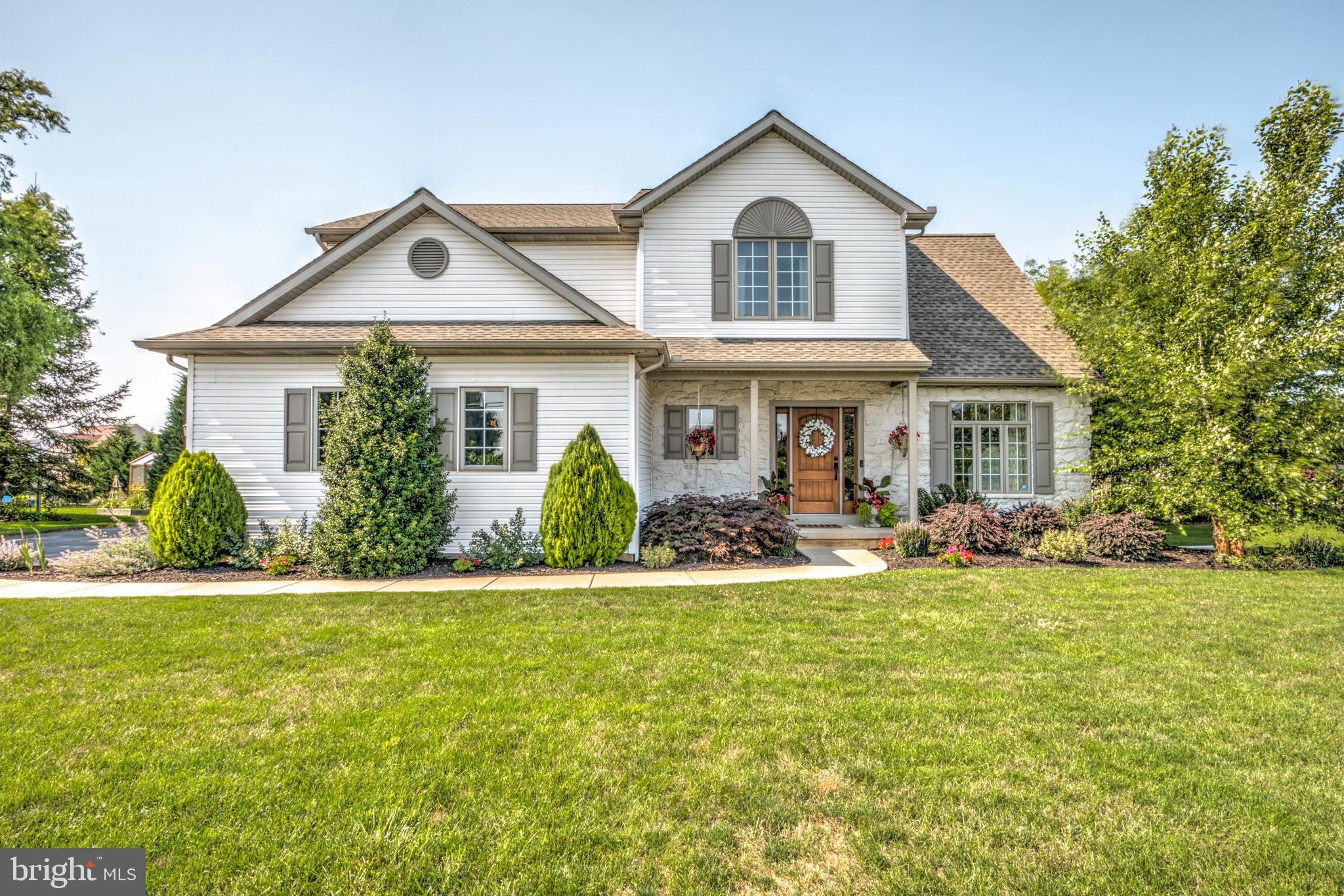 You’ll fall in love with this gorgeous 4 bedroom home with unique upgrades throughout! Beautiful hardwood floors, a 2 story vaulted ceiling foyer, formal dining area with crown molding and wainscoting, plus a beautiful kitchen with quartz countertops. The living room is open to the kitchen and you can’t help but notice the stone gas fireplace! You’ll love eating breakfast in the sunroom with its cedar cathedral ceilings and plenty of natural light. Enjoy quiet evenings on the new deck and patio, which is 650 sq.ft and includes a custom outdoor kitchen. Beautiful landscaping surrounds the property, including raised beds with various evergreen trees and landscape lighting for privacy year-round. All of the bedrooms are upstairs with upgraded closet shelving. The primary suite is spacious with a walk-in closet, tiled bathroom and jacuzzi tub. The finished basement offers another stone gas fireplace, built-in cabinets and plenty of storage. Optional office or exercise area with pocket door. This home is well maintained and move-in ready! Schedule a showing today!

There have been many improvements to this property:
Improved attic insulation to R40 for energy savings (2015), New basement floor (2016), New roof (2017), All recessed lights upgraded to LED (2018), Reverse osmosis drinking filtration system with 20 gallon pressurized expansion tank (2019), Insinkerator instant hot water machine (2019), Raised beds and landscaping around rear yard for privacy (2019),  Hot water hose line for washing cars (2020), New paver patio and deck with exterior home and landscape lighting (2020), Custom outdoor kitchen (2020), Upgraded closet shelving in bedrooms (2020), New Gas furnace & AC System (2021), Painted a majority of the downstairs (2022), New Gas Water Heater (2022)

*Disclaimer - The owner is a licensed Real Estate Broker