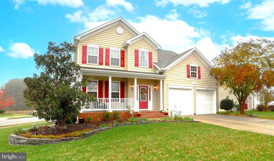 Highly sought after Broad Creek neighborhood.   This home has professional landscaping with stone garden beds.  Full of roses and Crepe Myrtle trees etc.  This 4 Bedroom 3 and a half bath Colonial is on a corner lot.  Walk into the 2 story foyer with hardwood cherry flooring.  Separate Formal Dining room with Box Trim.  Kitchen boast upgraded cabinetry with pantry.  Granite counters, recessed lighting and pendant lights over the center island.  Gas stove and double ovens.  Breakfast area walks out to spacious composite deck. Family room with gas fireplace.  Upstairs Primary Bedroom has a Library that could be a baby's room, a workout room or turned into a 5th Bedroom. The on suite Primary Bath has a soaking tub and a deluxe separate shower.  Never run out of hot water with a tankless hot water heater!  Separate sinks. Spacious 2nd and 3rd bedrooms.  Full Bath in Hall.  Through a hidden door (Murphy Door) in the kitchen, which looks like a bookcase, walk down to the fully finished basement.  This basement is plumbed for wet bar / kitchen.  Large Rec Room has upgraded composite flooring throughout.  4th Bedroom and third full Bathroom.
There is also a large storage room that has electric for a freezer or whatever you need.  The Backyard has a composite 6 foot fence for privacy.  There is a garden area and an herb garden around the Birdbath.  The Two Car Garage has professionally painted floors.  Wonderful neighborhood with sidewalks and street lights.  Close to PaxRiver Naval Air Station, Shopping and Hospital.  You must see to appreciate!