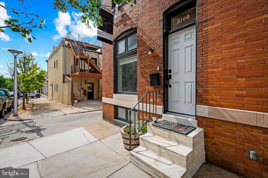 Great end-unit home just one block from Patterson Park with off street parking.

Flooded with natural light, this charming Baltimore home offers the perfect blend of historic character and contemporary comfort. Your entry way has the original tile and two door entering into your main floor. Original hardwood floors flow throughout the first and second floors and your double sided gas fireplace is the perfect spot to cozy up to in the cooler months and provides nice separation between the living area and the dining area. The kitchen has a peninsula that's great for extra prep space or to pull up a stool for a meal. Off the back of the kitchen you walk out to your private covered parking spot.

The second floor features a primary bedroom with large closet, exposed bricks, an archway, and bonus area with built in bench. There's another nicely sized bedroom with three large windows and access to the two-tiered deck- great for entertaining. Rounding out the second floor is a full bathroom with jacuzzi tub.  The fully finished basement has a third full bedroom space plus a bonus space (great for an office) and its own full bathroom providing a lot of versatility.

Recent upgrades ensure peace of mind and modern convenience:

New furnace (2024)
New hot water heater (2025)
New roof (2022)
New sump pump (2022)
New appliances including dishwasher, microwave, and washing machine

This property stands out with its coveted off-street parking and proximity to Patterson Park and lots of shops, restaurants, coffee shops, and major commuter routes.