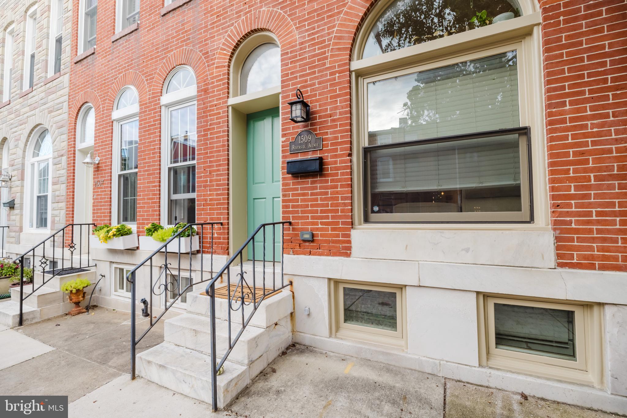 DO NOT miss this 3 Bed 3 Full Bath Riverside home perfectly situated just steps away from Riverside Park! Gorgeous renovation meets classic Baltimore charm! The heart of the home is a Chef's dream gourmet kitchen with custom soft-close cabinetry, granite counters and stainless steel appliances walks out to decorative fence courtyard style back yard with well kept homes in every view -perfect for relaxing or entertaining! The spacious living room features large atrium window with abundant natural light and exposed brick walls. The Primary bedroom boasts vaulted ceilings and spa bath with large custom shower! Second bedroom is a good size as well and has a dedicated 2nd full bath on upper level. RARE Fully finished lower level with 8 foot ceilings, Great family room, an additional bed room or Gym, and 2nd full bath! Exposed brick, great natural light and beautiful hardwoods throughout. New rooftop deck with 360 views including Riverside Park! Convenient to all that downtown has to offer yet set apart from the hustle near the Park as well, Owner's boast easy parking! A REAL MUST SEE!!!