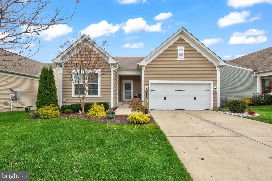 Welcome home to this stunning 3-bedroom, 3-full-bath residence boasting approximately 3,154 finished square feet in the highly sought-after Celebrate Virginia North community! Gleaming hardwood floors flow throughout most of the main level, guiding you from the foyer and study into the inviting heart of the home.

Just beyond the study/home office, an expansive open-concept layout seamlessly blends the family room, kitchen, dining area, and a bright  sunroom. The chef’s kitchen impresses with an oversized island offering extra storage, gleaming granite countertops, and beautiful cabinetry. The family room showcases an elegant coffered ceiling, while the sunroom opens to a charming 14' x 14' three-season room and a 12' x 12' Trex deck—perfect for relaxing outdoors in comfort.

The owner’s suite provides a peaceful retreat, complete with dual vanities and a spacious walk-in closet. The finished, walkout basement—filled with natural light—adds exceptional versatility, featuring a full bathroom, bedroom, and an expansive open area ideal for entertaining, guests, or hobbies.

Celebrate Virginia North is an amenity-rich, active-adult community offering a yoga room, ballroom, heated Olympic-sized indoor pool, outdoor pool, poker room, bar area, tennis courts, and a fully equipped fitness center. Beautifully maintained landscaping is included, ensuring a low-maintenance lifestyle.

Perfectly located just minutes from I-95, shopping, dining, and the Spotsylvania Town Center, this home delivers both luxury and convenience. Don’t miss your opportunity to enjoy resort-style living in one of the area’s most desirable communities!